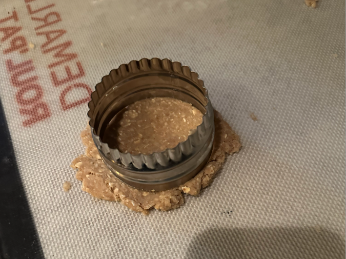 Cookie dough with cutter on top