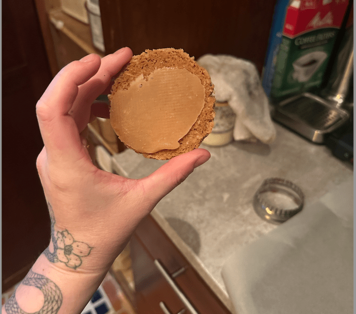 Splat of caramel on bottom of cookie