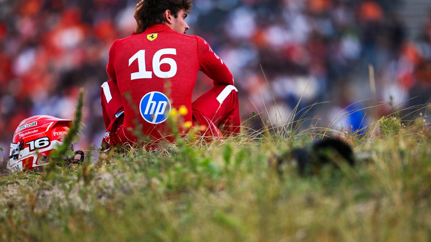 Charles Leclerc of Monaco and Scuderia Ferrari looks on from the dunes after crashing out of the race.