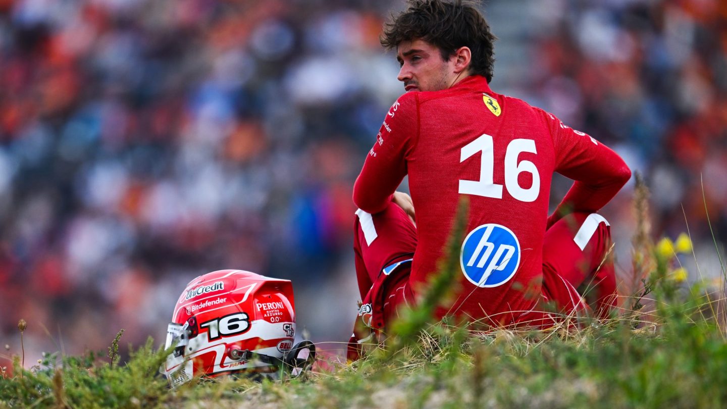 Charles Leclerc of Monaco and Scuderia Ferrari looks on from the dunes.