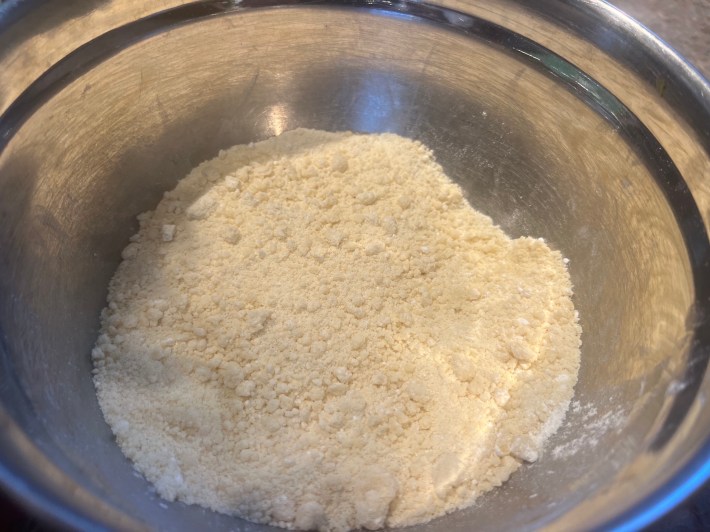 Butter and flour rubbed together in a metal bowl
