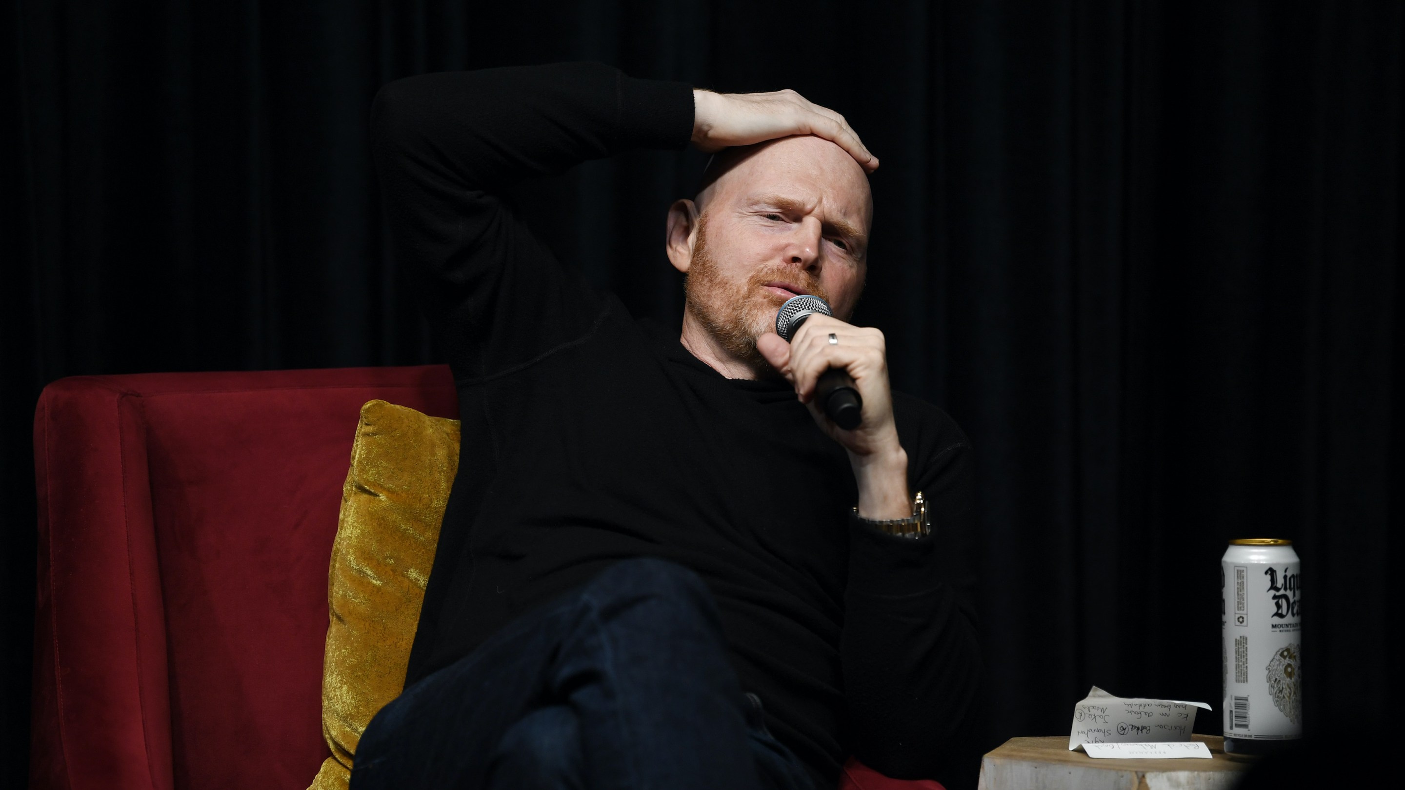 Bill Burr talks on stage.