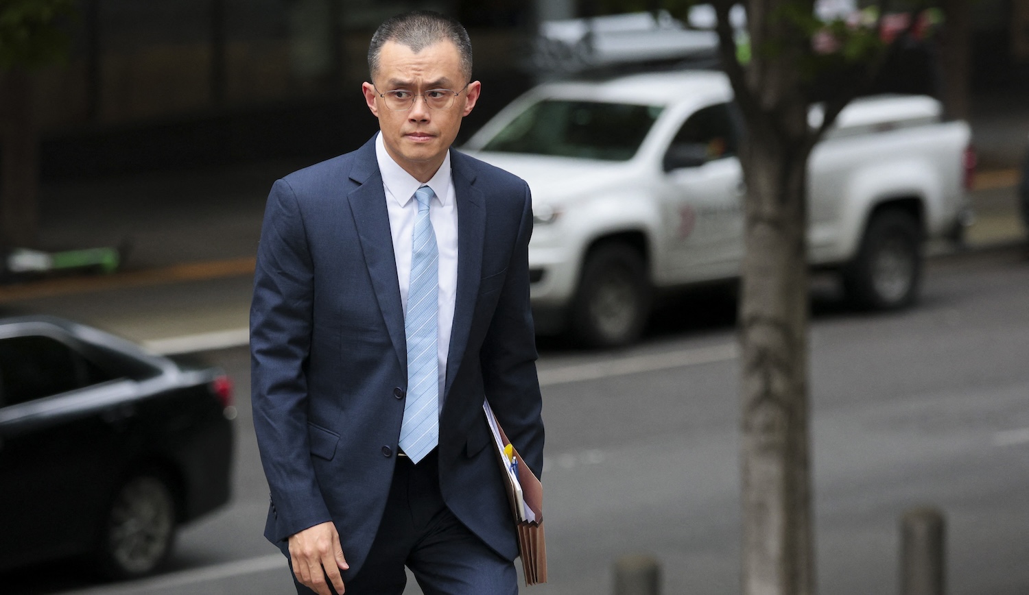 Former Binance CEO Changpeng "CZ" Zhao arrives at federal court in Seattle, Washington, on April 30, 2024. Changpeng Zhao, the founder and former chief executive of Binance, the world's largest cryptocurrency exchange, was sentenced today to four months in prison after he pleaded guilty to violating laws against money laundering. (Photo by Jason Redmond / AFP)
