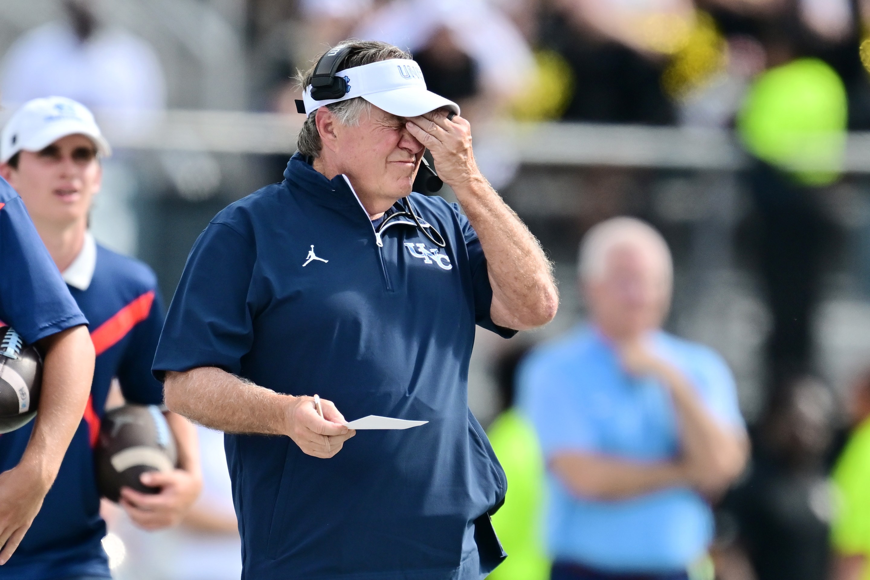 Head coach Bill Belichick of the North Carolina Tar Heels reacts in the first half of a game against the UCF Knights on September 20, 2025.