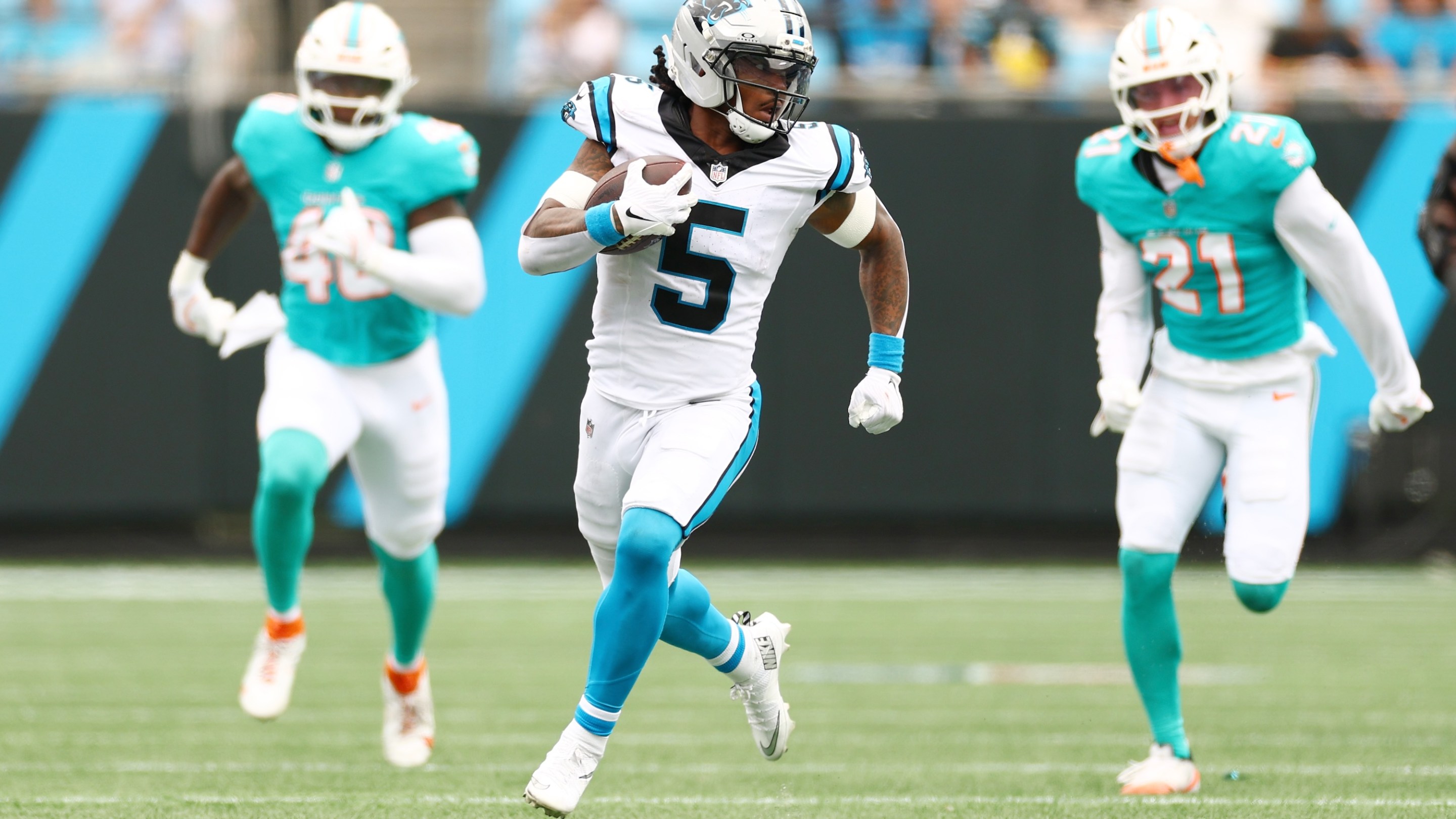 CHARLOTTE, NORTH CAROLINA - OCTOBER 05: Rico Dowdle #5 of the Carolina Panthers carries the ball during the third quarter against the Miami Dolphins in the game at Bank of America Stadium on October 05, 2025 in Charlotte, North Carolina. (Photo by Grant Halverson/Getty Images)