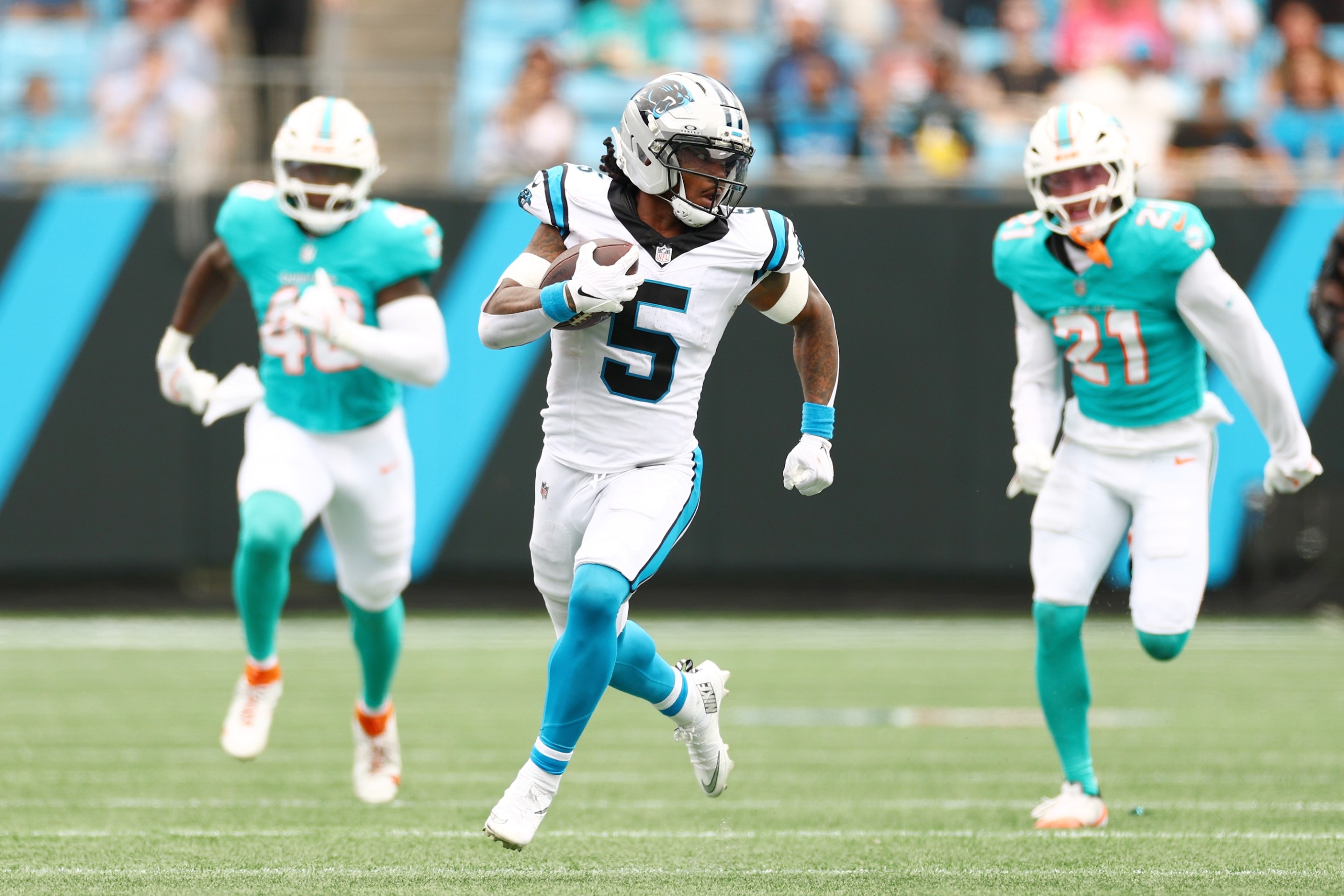 CHARLOTTE, NORTH CAROLINA - OCTOBER 05: Rico Dowdle #5 of the Carolina Panthers carries the ball during the third quarter against the Miami Dolphins in the game at Bank of America Stadium on October 05, 2025 in Charlotte, North Carolina. (Photo by Grant Halverson/Getty Images)