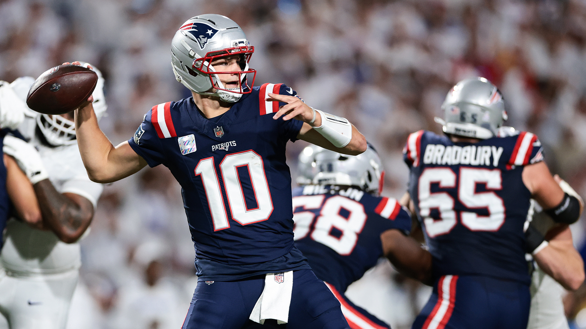 Drake Maye #10 of the New England Patriots throws a pass during the first quarter against the Buffalo Bills at Highmark Stadium on October 5, 2025 in Orchard Park, New York.