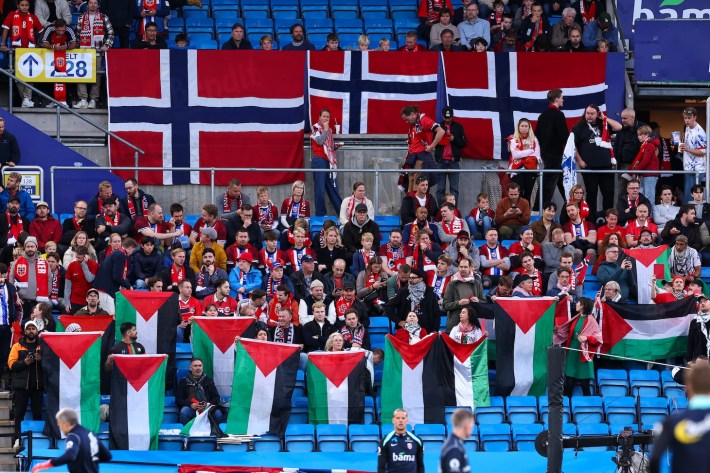 Fans of Norway hold up Palestine flags ahead of the FIFA World Cup 2026 qualifier match between Norway and Israel at Ullevaal Stadion on October 11, 2025 in Oslo, Norway.