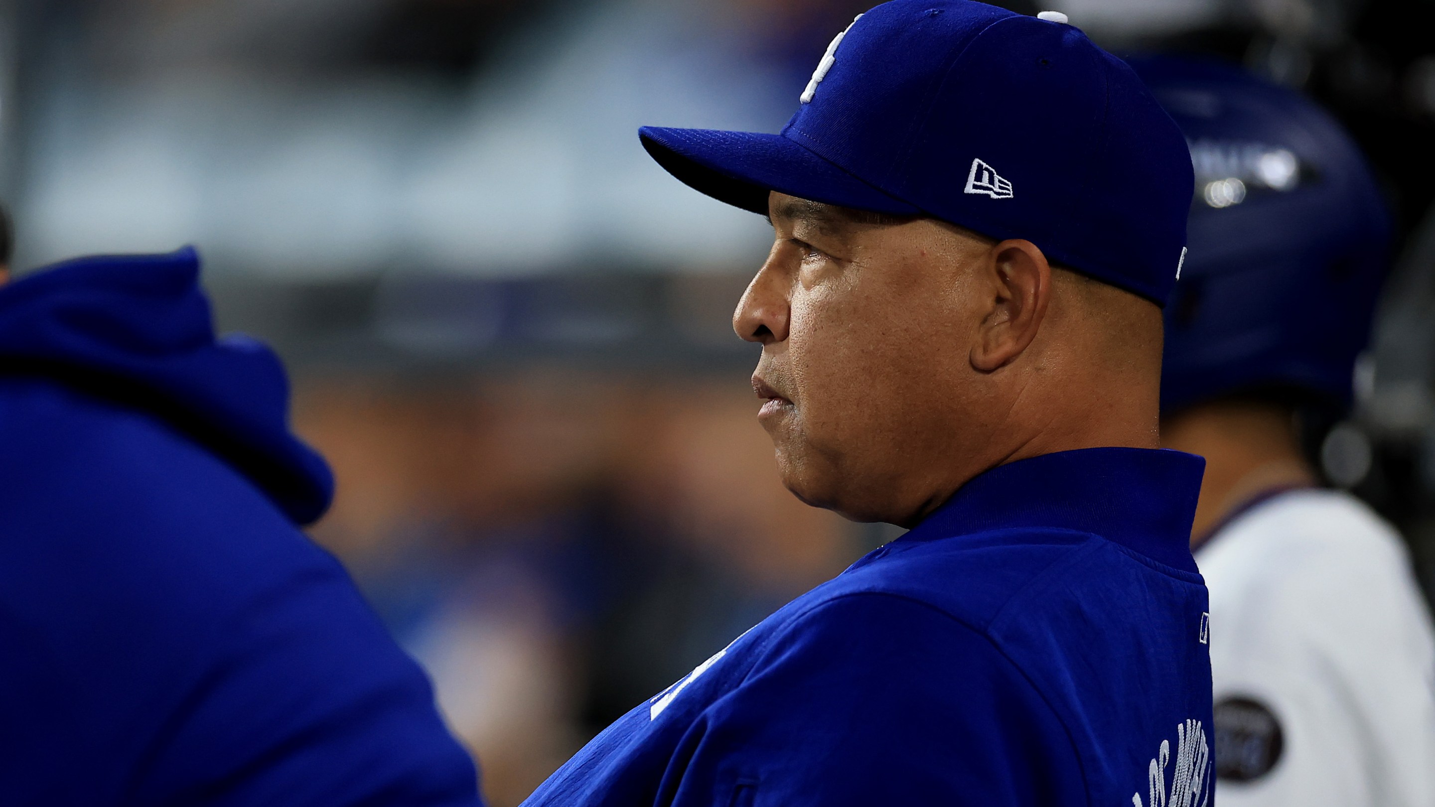 Manager Dave Roberts of the Los Angeles Dodgers looks on against the Philadelphia Phillies in the NLDS. He's been doing a lot of "looking on."