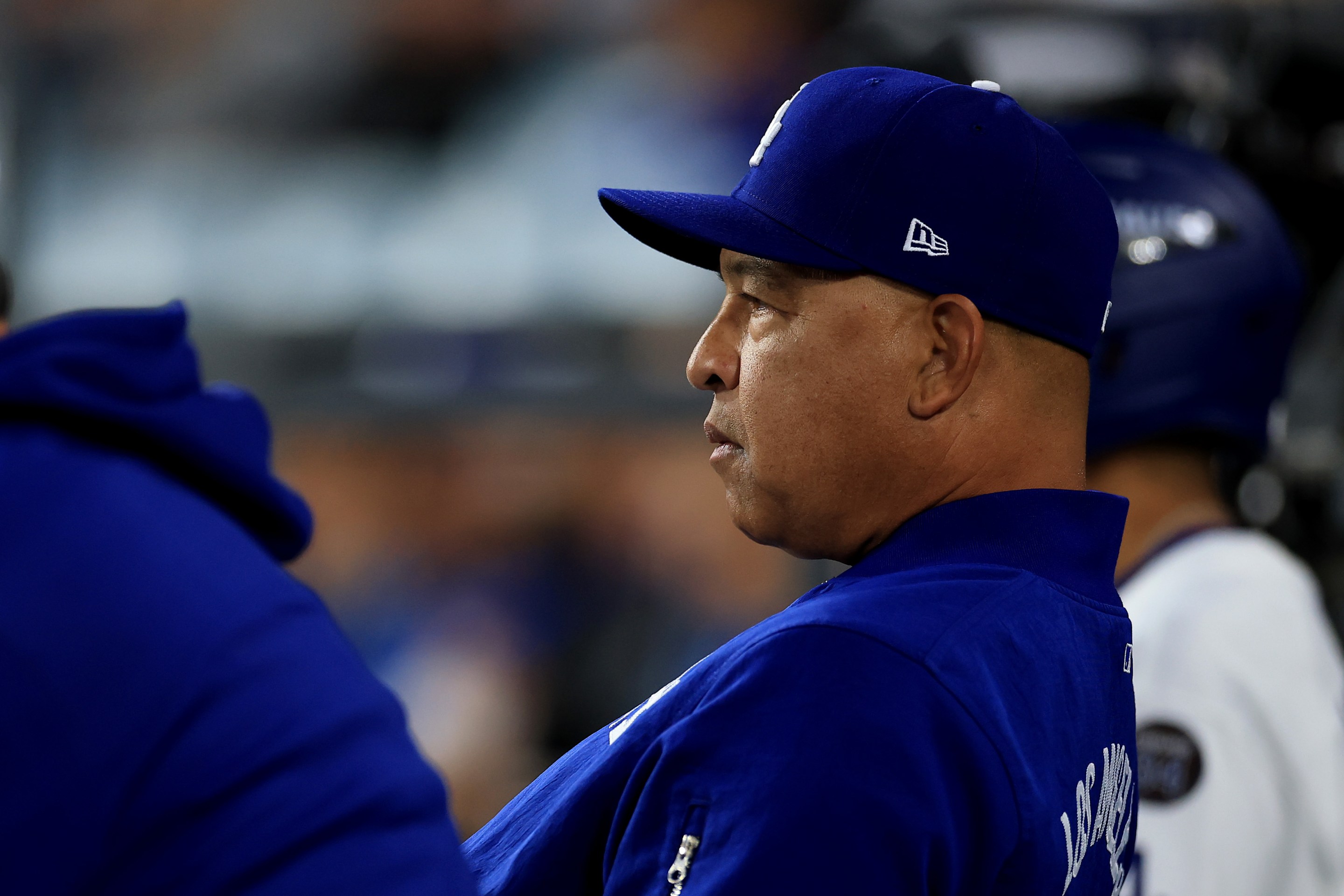 Manager Dave Roberts of the Los Angeles Dodgers looks on against the Philadelphia Phillies in the NLDS. He's been doing a lot of "looking on."