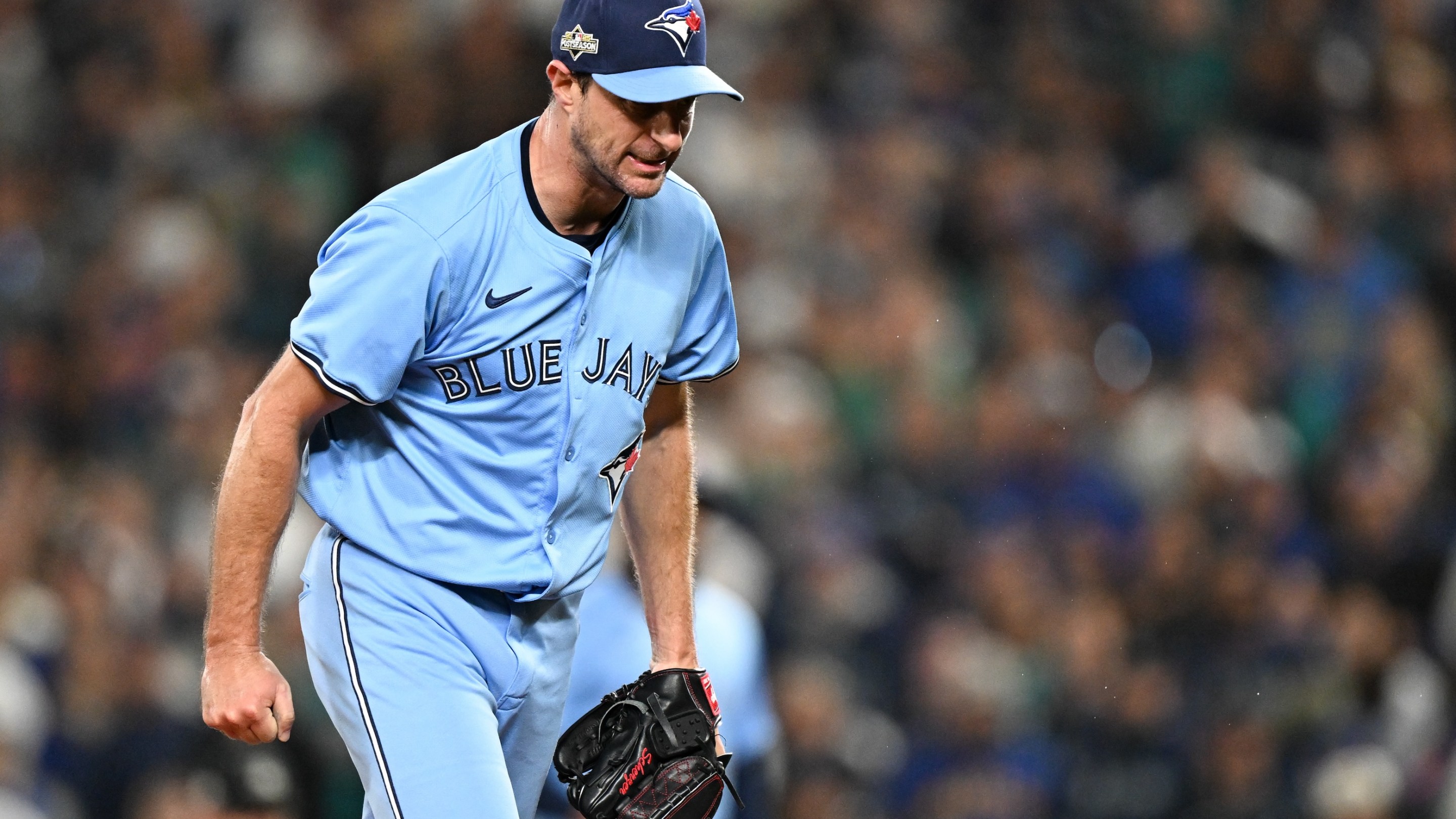 Max Scherzer of the Toronto Blue Jays reacts after striking out Randy Arozarena #56 of the Seattle Mariners in the fifth inning during Game Four of the American League Championship Series. He is making "the Tim Robinson face."
