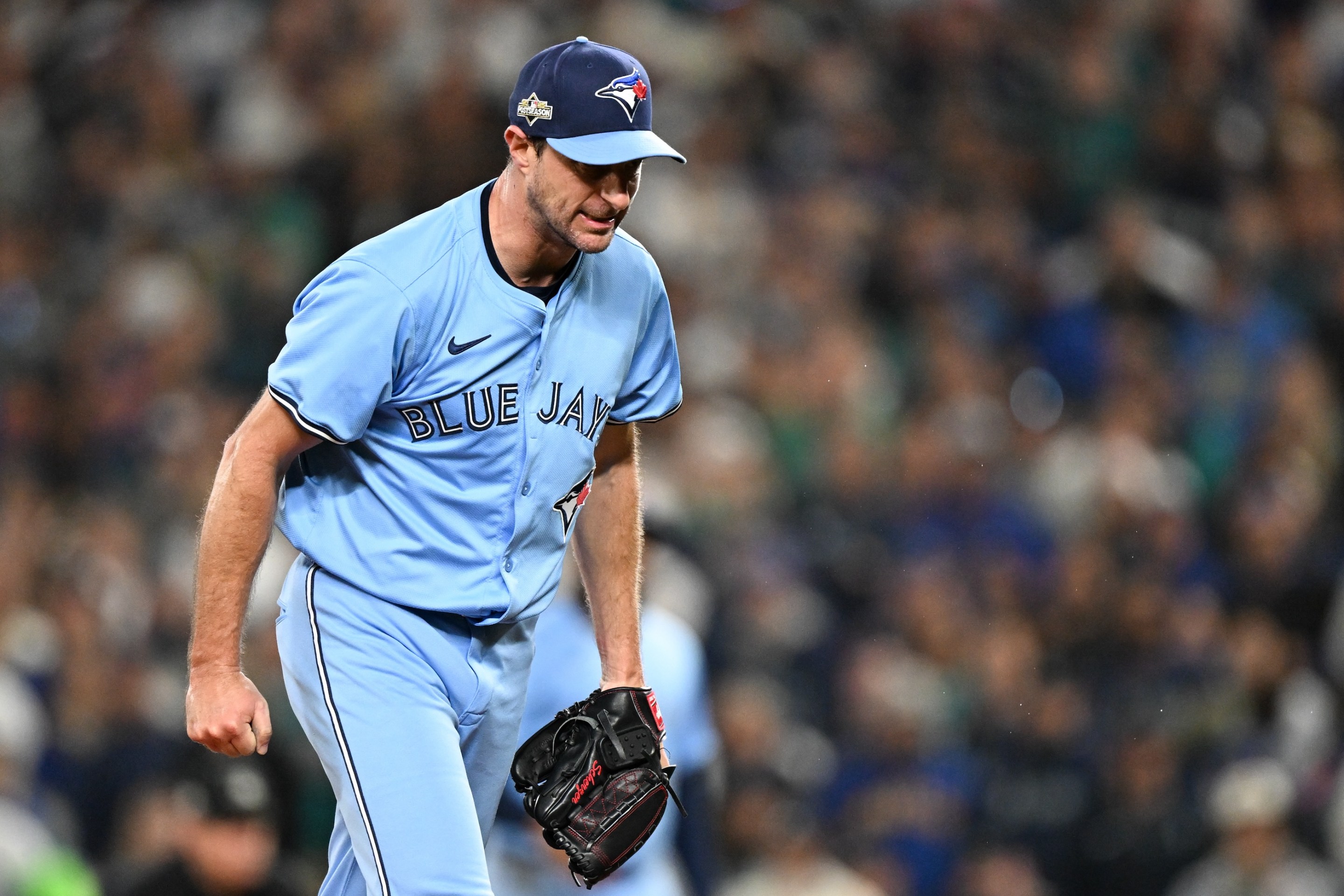 Max Scherzer of the Toronto Blue Jays reacts after striking out Randy Arozarena #56 of the Seattle Mariners in the fifth inning during Game Four of the American League Championship Series. He is making "the Tim Robinson face."