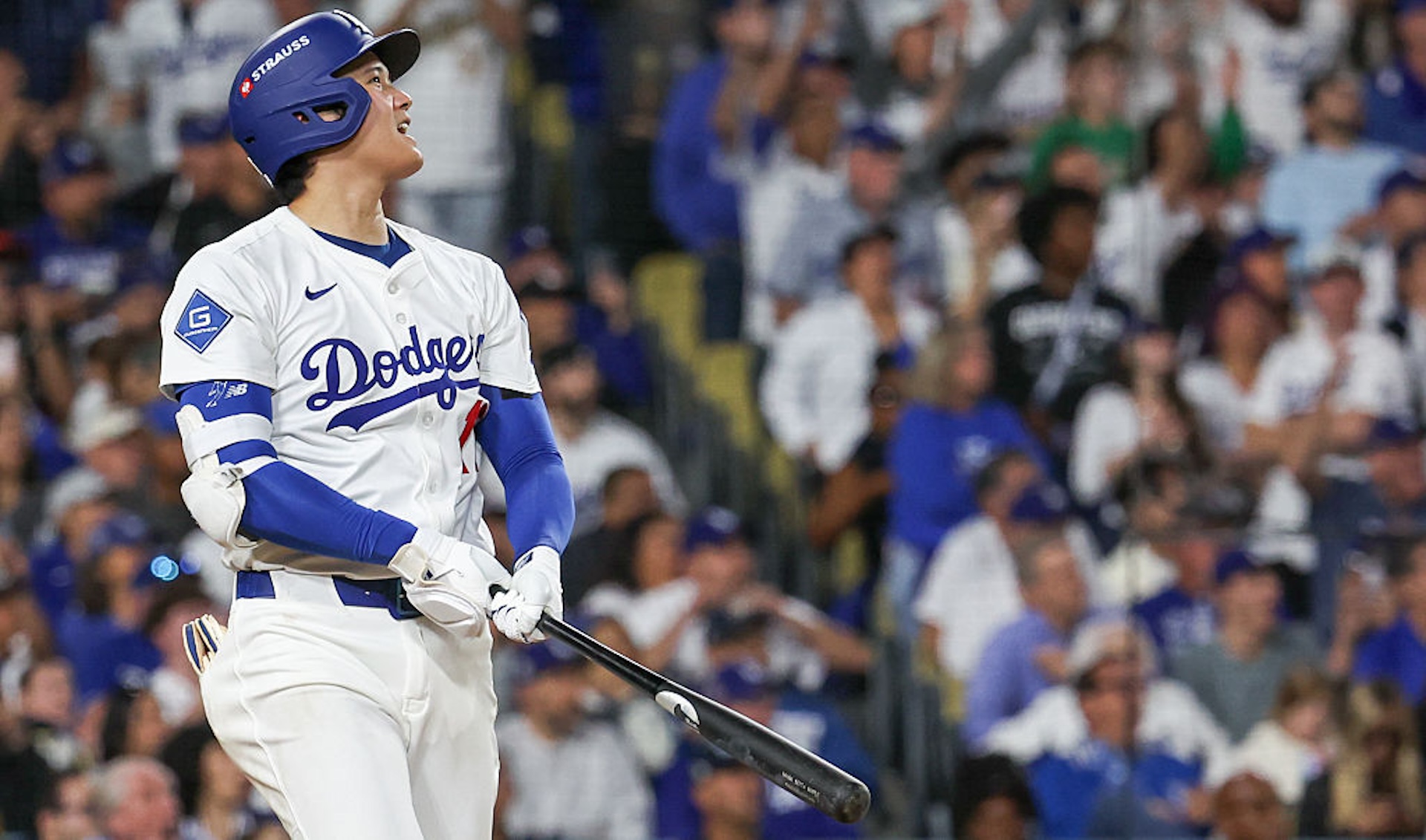 Shohei Ohtani #17 of the Los Angeles Dodgers looks on after hitting a solo home run in the seventh inning during Game Four of the National League Championship Series