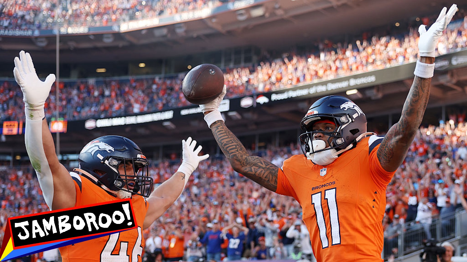 Adam Prentice #46 and Troy Franklin #11 of the Denver Broncos celebrate after Franklin's receiving touchdown in the fourth quarter of a game against the New York Giants at Empower Field At Mile High on October 19, 2025 in Denver, Colorado.