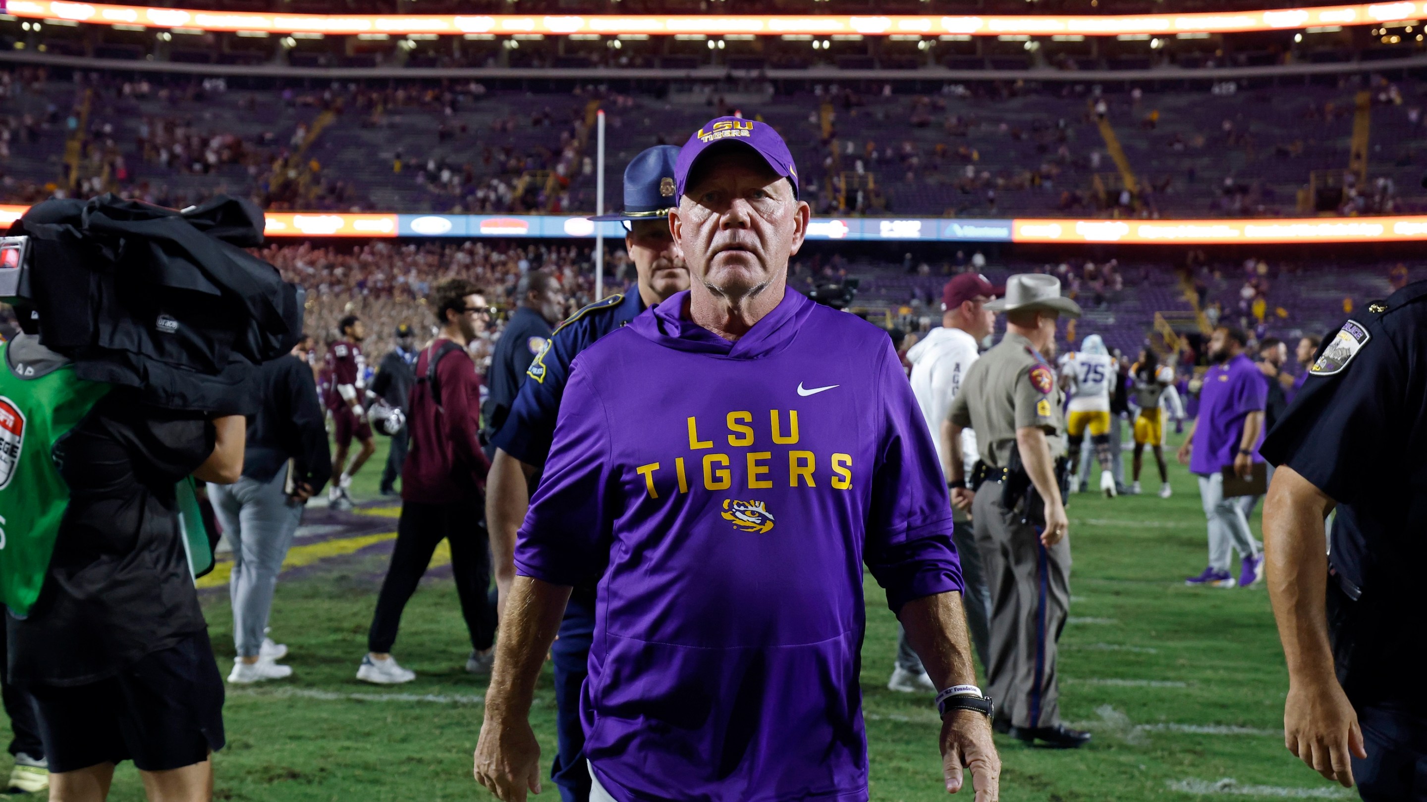 Head coach Brian Kelly of the LSU Tigers walks off the field after a game against Texas A&M on October 25 in Baton Rouge. He kind of looks like someone who is about to get fired.