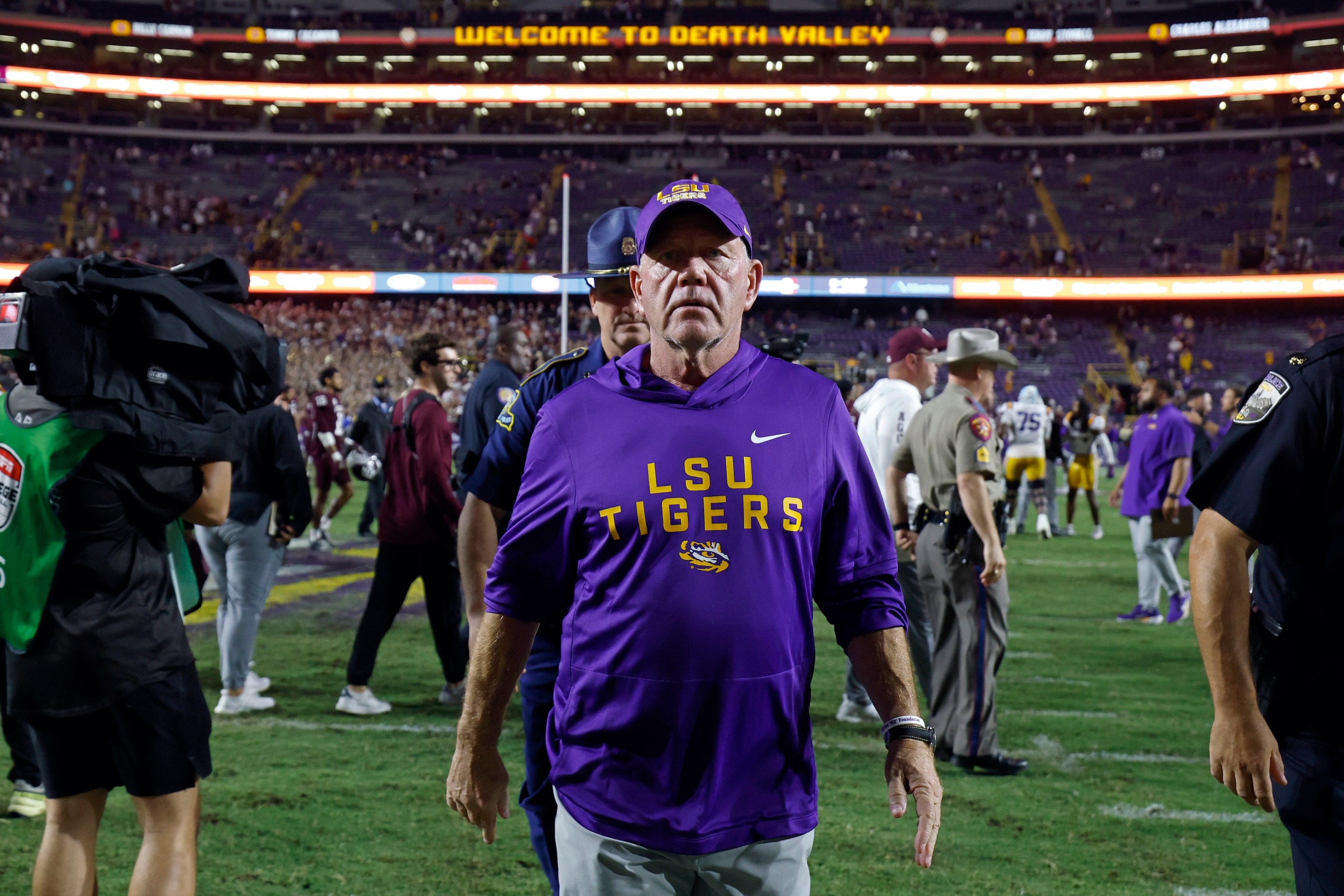 Head coach Brian Kelly of the LSU Tigers walks off the field after a game against Texas A&M on October 25 in Baton Rouge. He kind of looks like someone who is about to get fired.