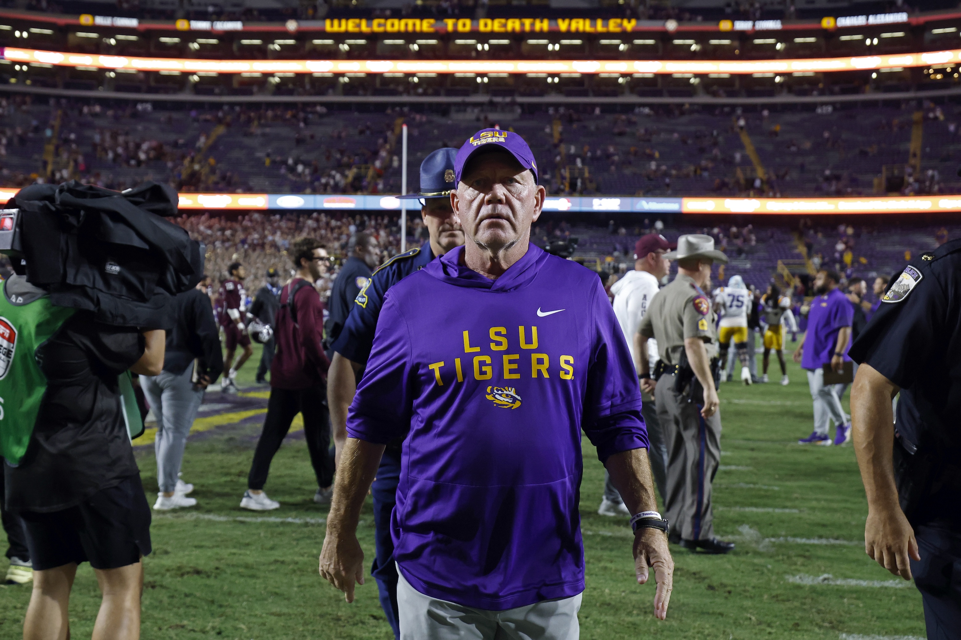 Head coach Brian Kelly of the LSU Tigers walks off the field after a game against Texas A&M on October 25 in Baton Rouge. He kind of looks like someone who is about to get fired.