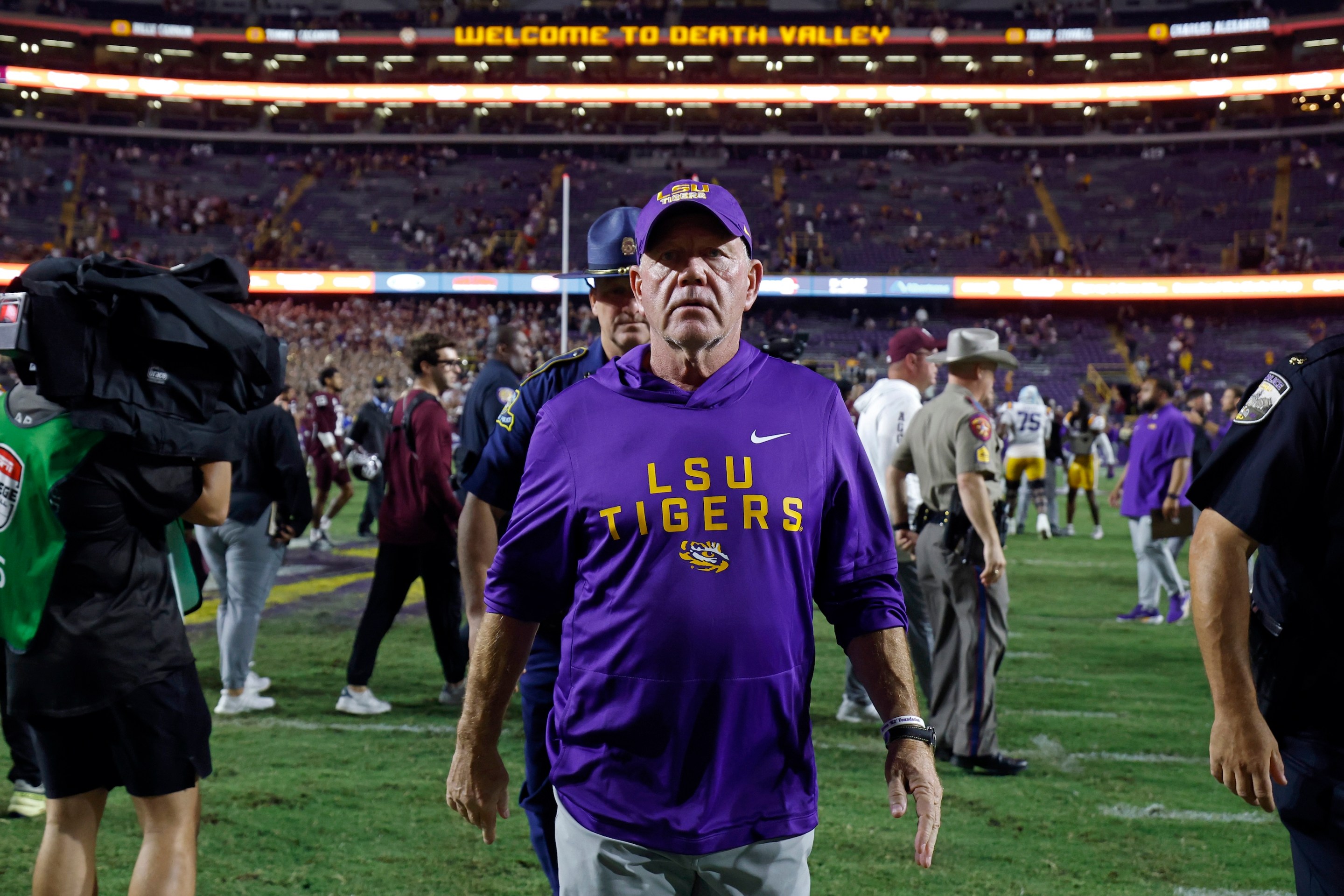 Head coach Brian Kelly of the LSU Tigers walks off the field after a game against Texas A&M on October 25 in Baton Rouge. He kind of looks like someone who is about to get fired.