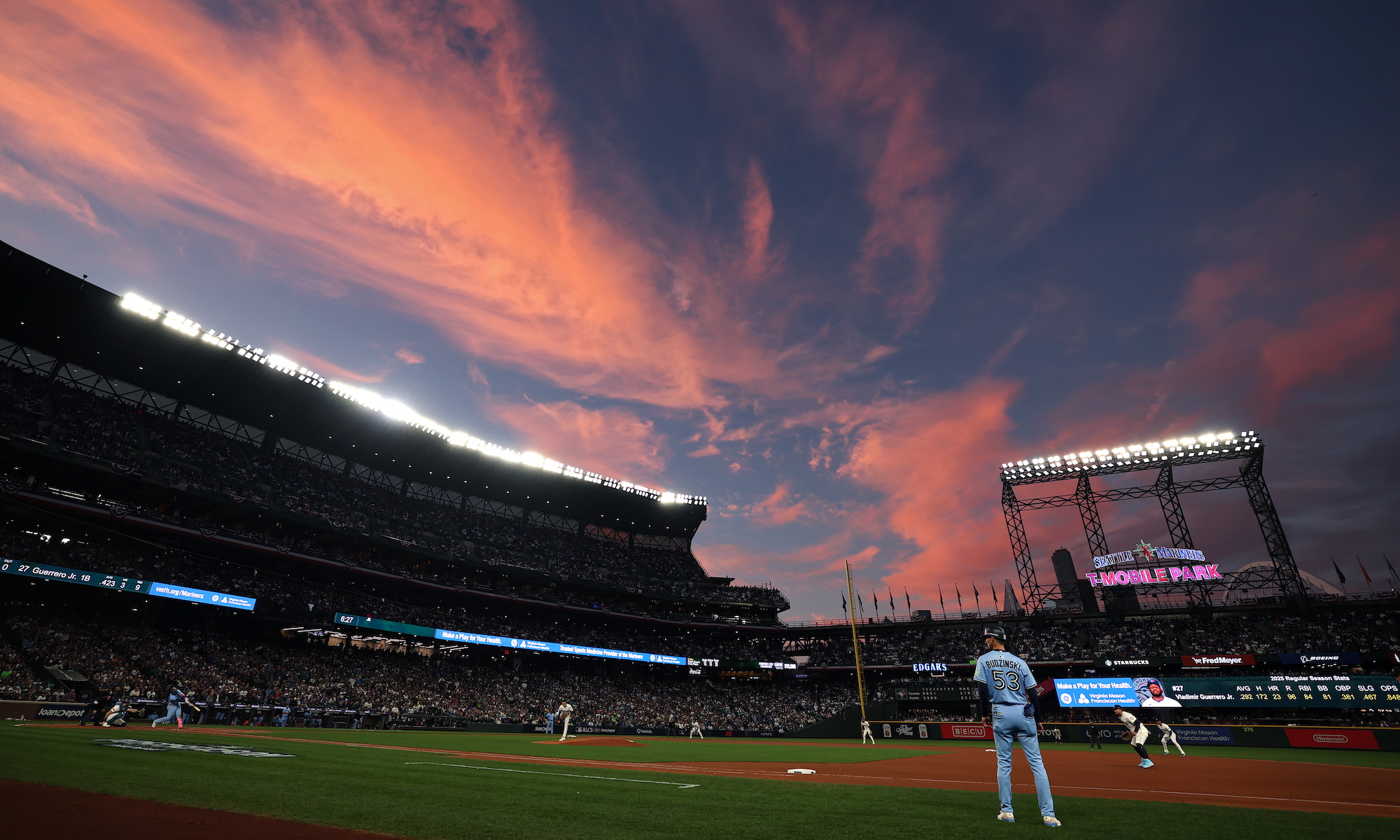 Vladimir Guerrero Jr. #27 of the Toronto Blue Jays hits a home run during the fifth inning against the Seattle Mariners in game three of the American League Championship Series on October 15, 2025 in Seattle, Washington.