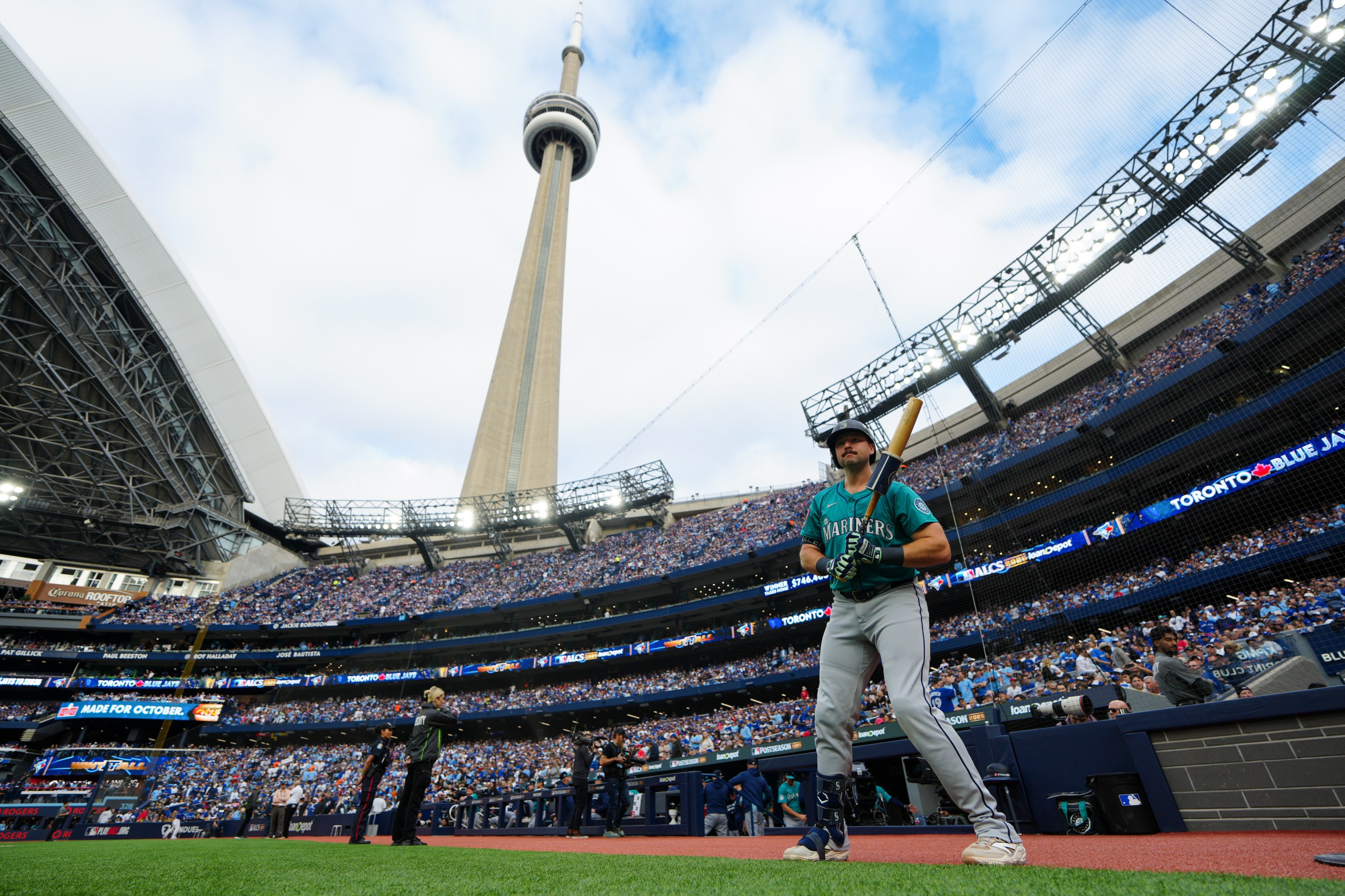 Cal Raleigh #29 of the Seattle Mariners prepares to bat in the first inning, in front of the backdrop of the CN Tower.