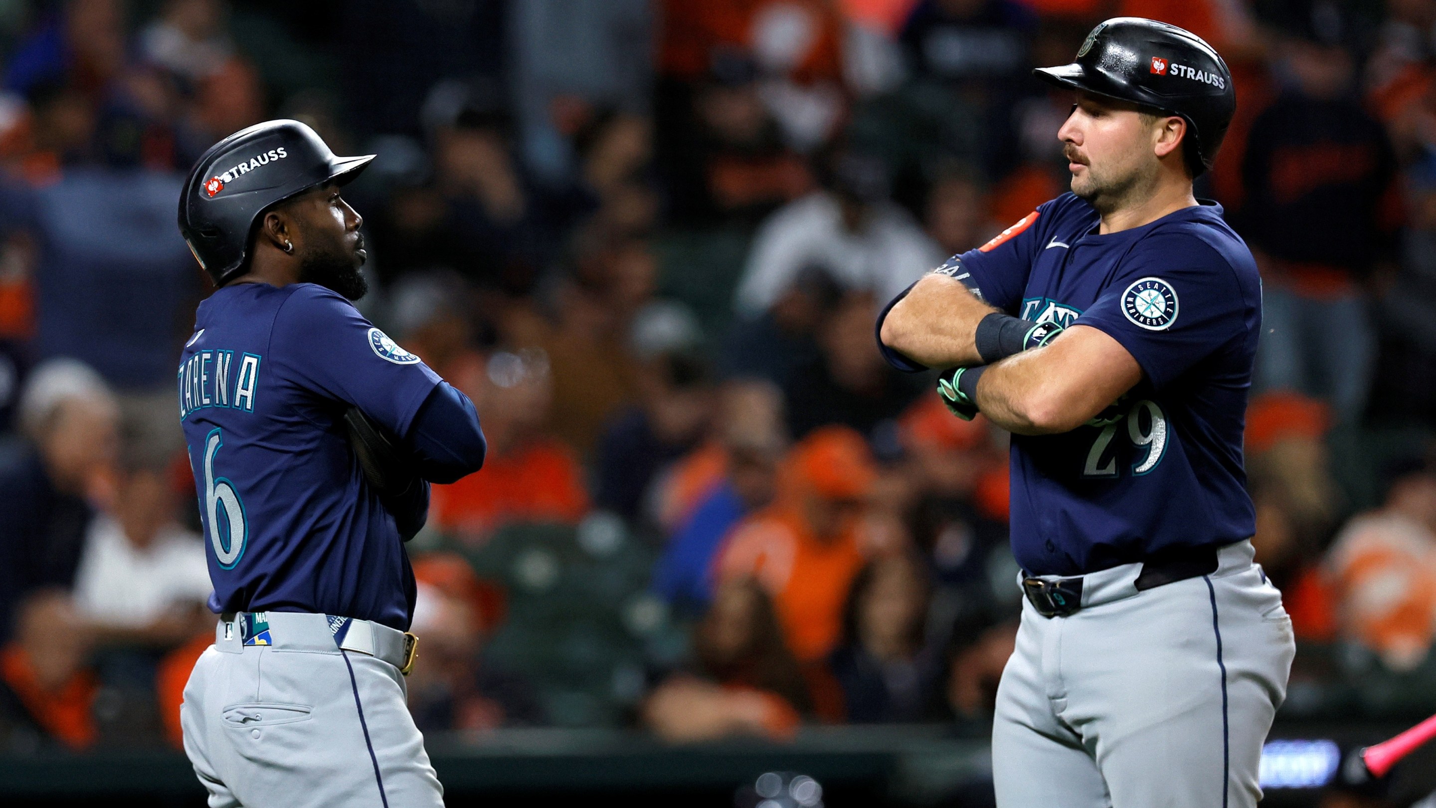 Cal Raleigh #29 of the Seattle Mariners celebrates with Randy Arozarena #56 after hitting a two-run home run.