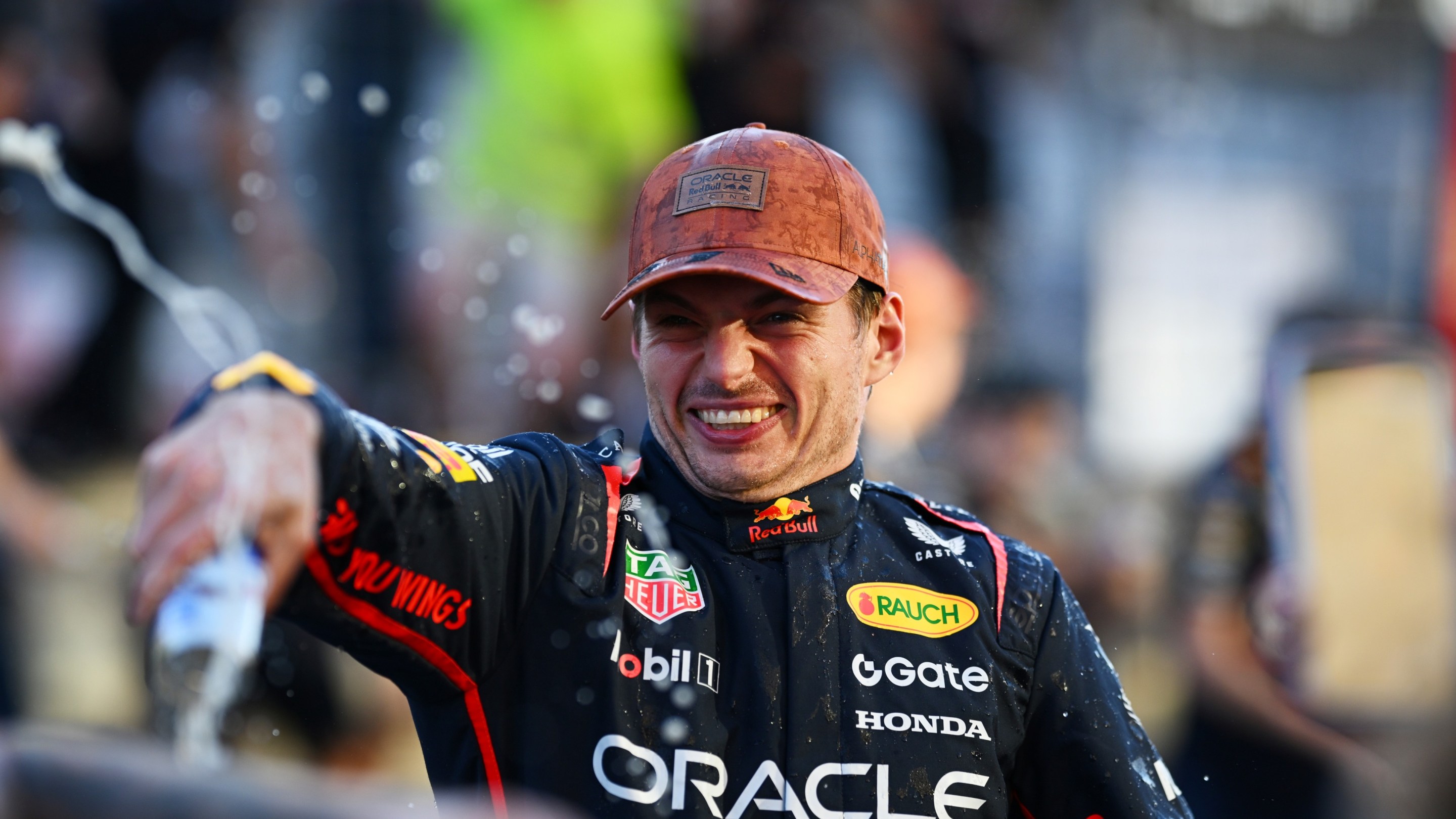 Race winner Max Verstappen of the Netherlands and Oracle Red Bull Racing celebrates victory with his team.