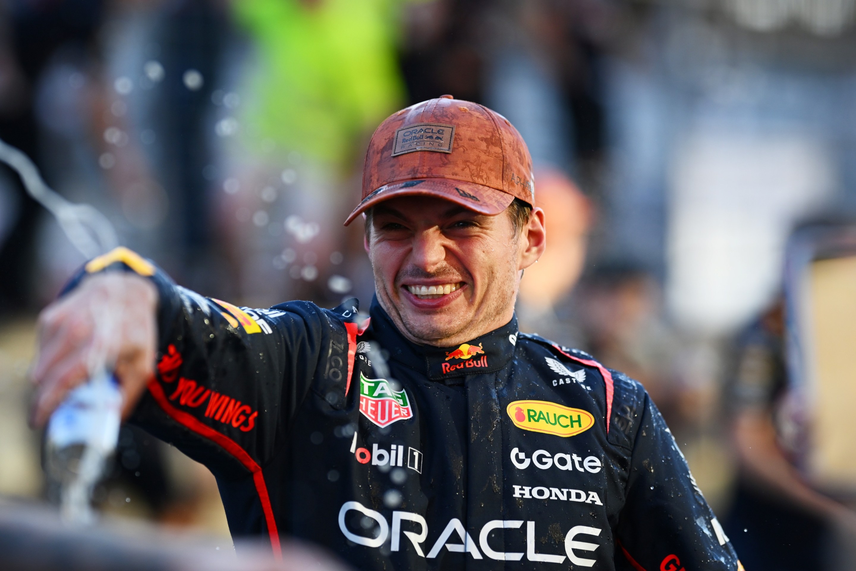 Race winner Max Verstappen of the Netherlands and Oracle Red Bull Racing celebrates victory with his team.
