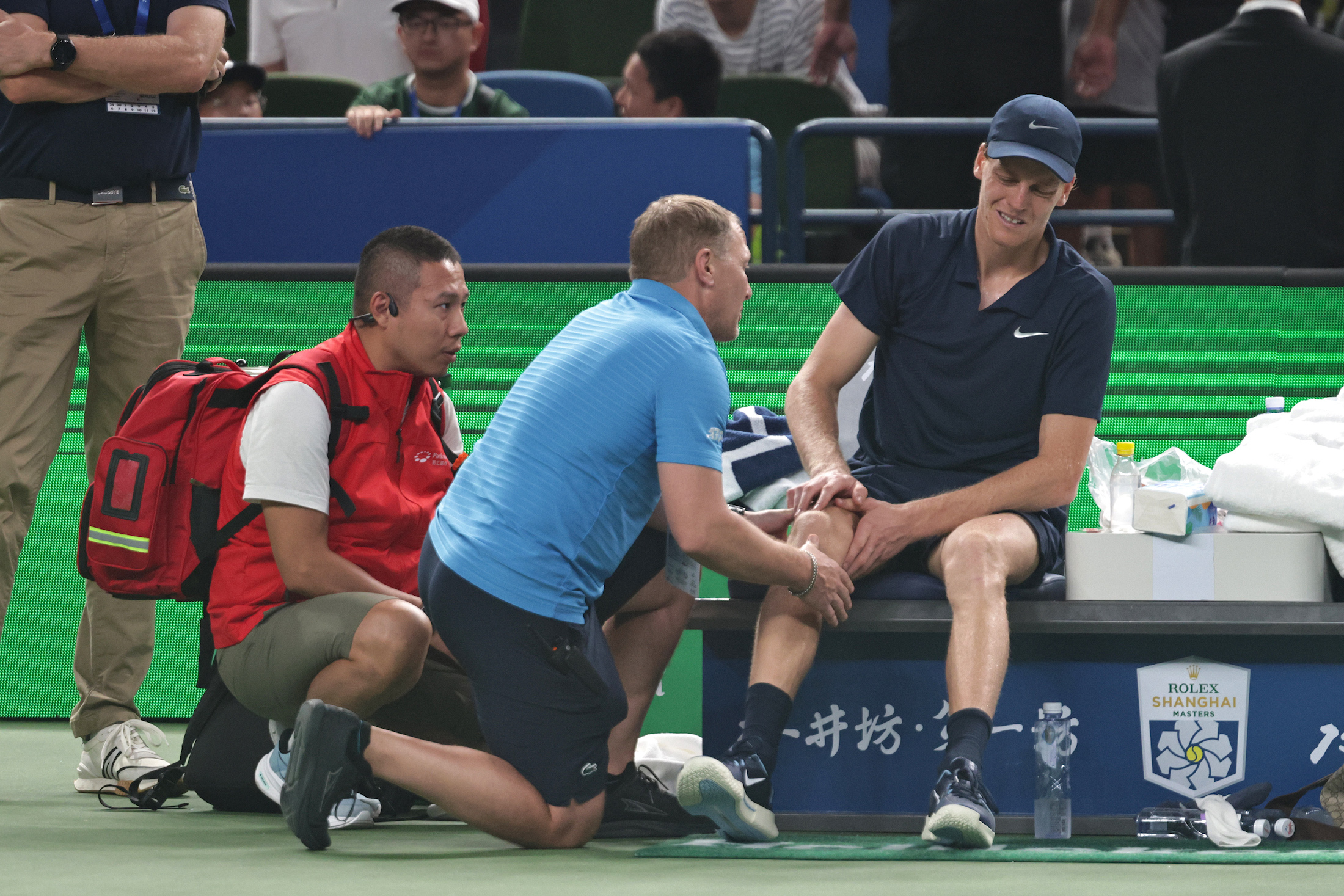 Jannik Sinner of Italy withdraws due to injury during the match against Tallon Griekspoor of Netherlands in the Men's Singles 3rd round match on day 7 of the 2025 Shanghai Rolex Masters Qi Zhong Tennis Center on October 05, 2025 in Shanghai, China. (Photo by Hu Chengwei/Getty Images)