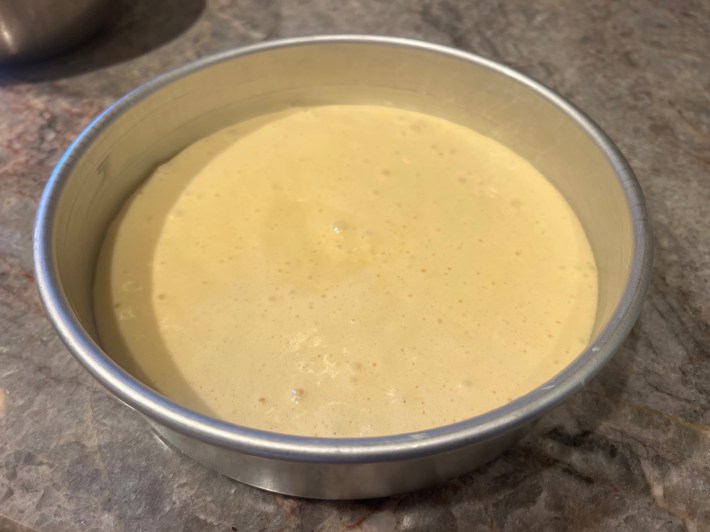 Batter in a cake tin.