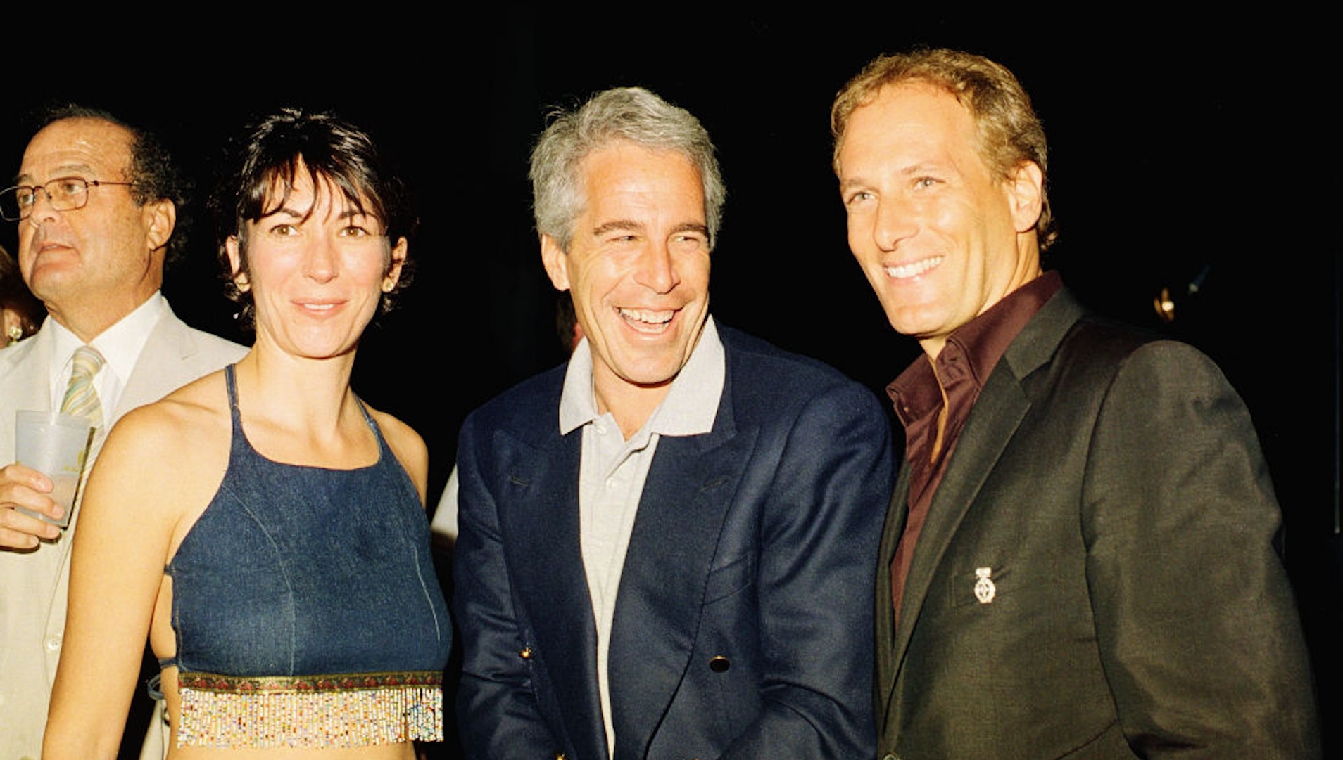 (L-R) Ghislaine Maxwell, Jeffrey Epstein, and musician Michael Bolton pose for a portrait during a party at the Mar-a-Lago club, Palm Beach, Florida, February 12, 2000.