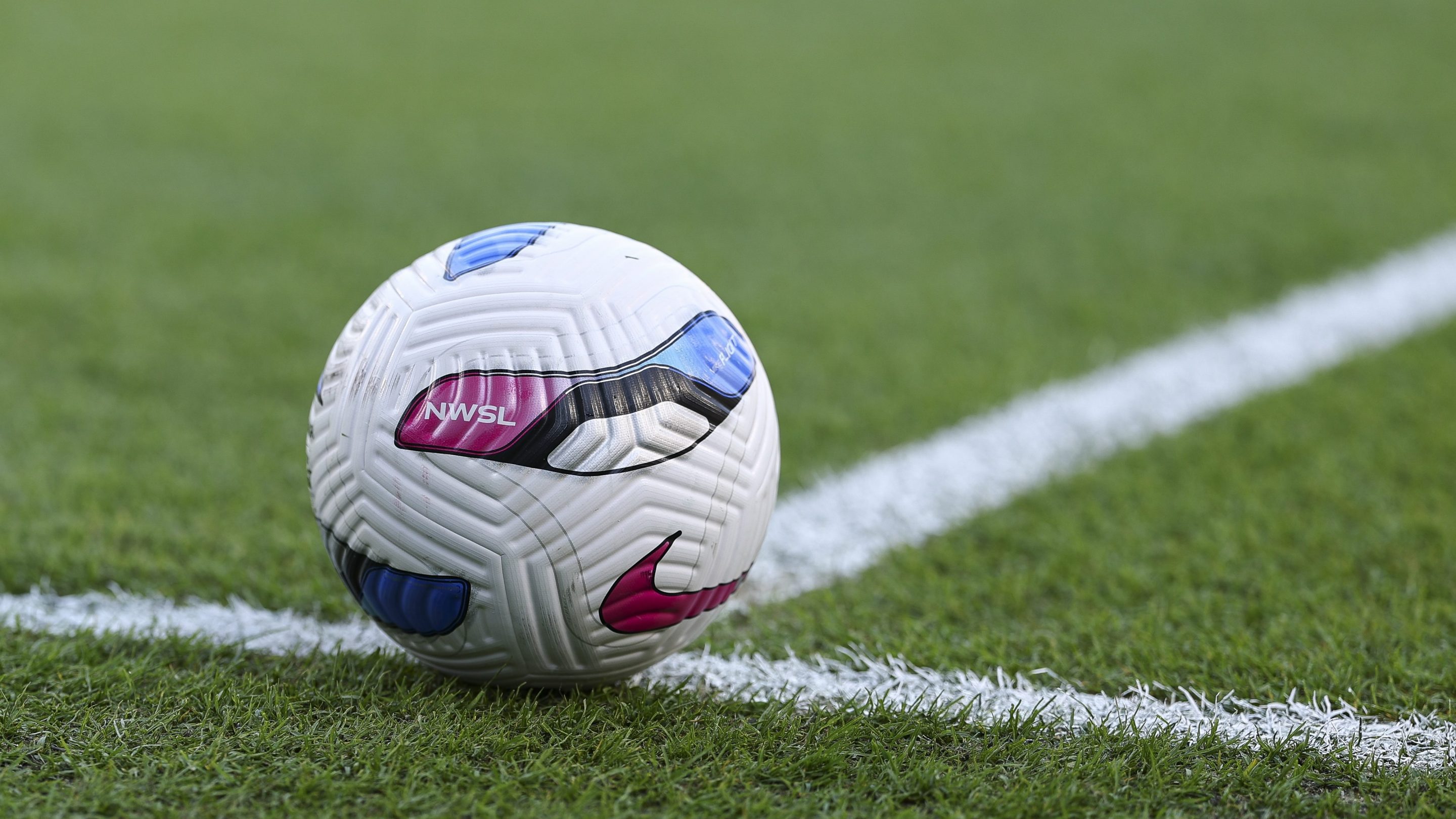 A detail of the NWSL logo on a game ball prior to the NWSL match between the Houston Dash and the Angel City FC at Shell Energy Stadium on April 12, 2025 in Houston, Texas.