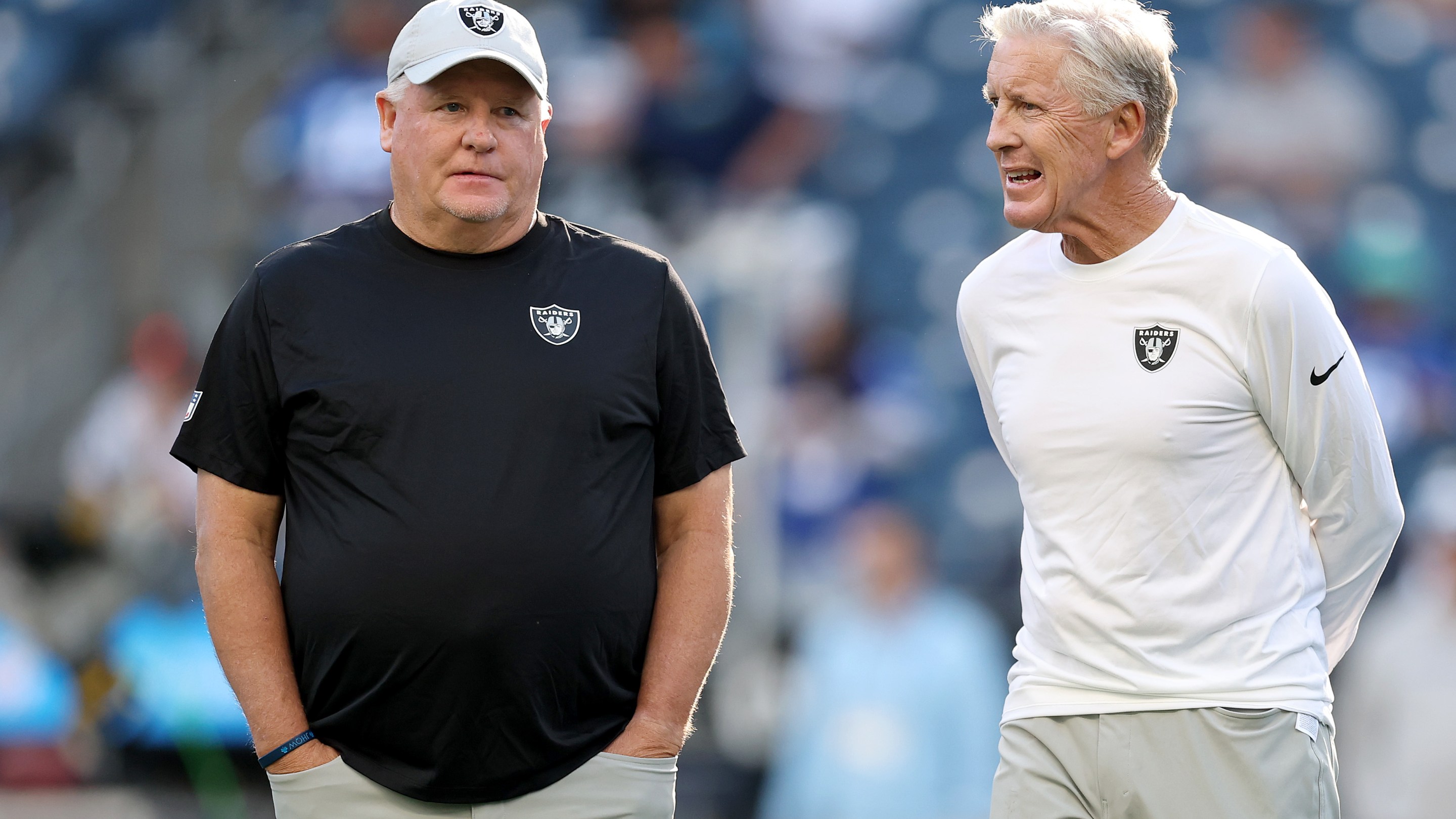 SEATTLE, WASHINGTON - AUGUST 07: Offensive coordinator Chip Kelly and head coach Pete Carroll of the Las Vegas Raiders before the NFL Preseason 2025 game between Las Vegas Raiders and Seattle Seahawks at Lumen Field on August 07, 2025 in Seattle, Washington. (Photo by Steph Chambers/Getty Images)