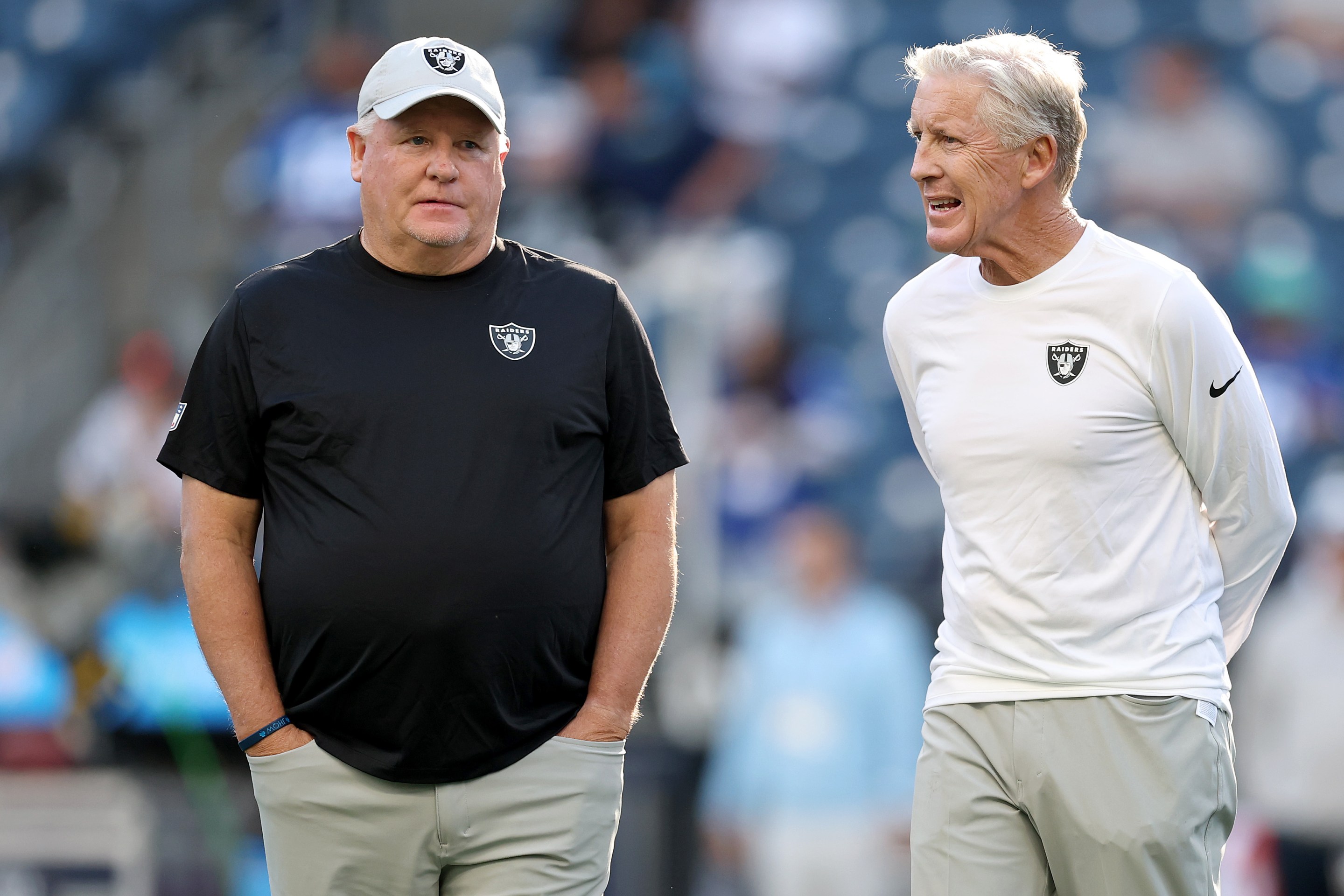 SEATTLE, WASHINGTON - AUGUST 07: Offensive coordinator Chip Kelly and head coach Pete Carroll of the Las Vegas Raiders before the NFL Preseason 2025 game between Las Vegas Raiders and Seattle Seahawks at Lumen Field on August 07, 2025 in Seattle, Washington. (Photo by Steph Chambers/Getty Images)