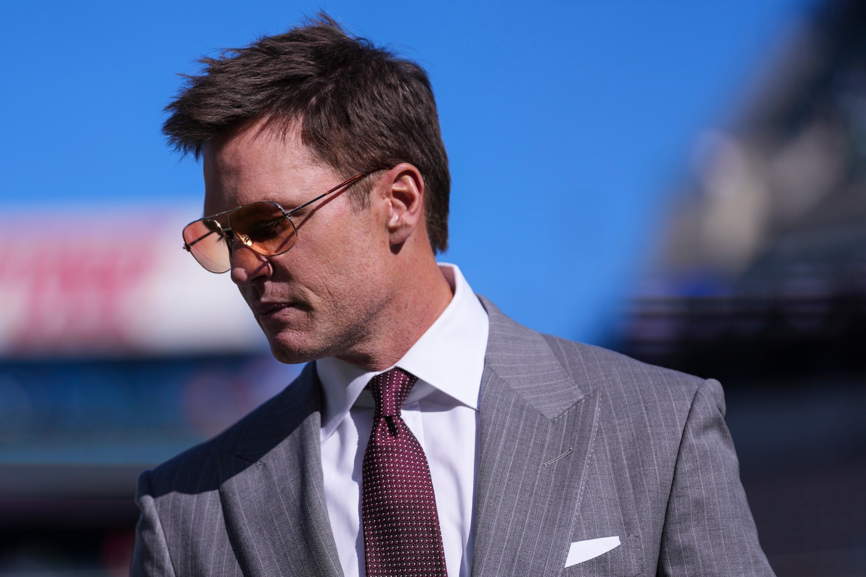 PHILADELPHIA, PENNSYLVANIA - OCTOBER 26: Tom Brady looks on from the field during warmups prior to an NFL football game between the New York Giants and the Philadelphia Eagles at Lincoln Financial Field on October 26, 2025 in Philadelphia, Pennsylvania. (Photo by Perry Knotts/Getty Images)