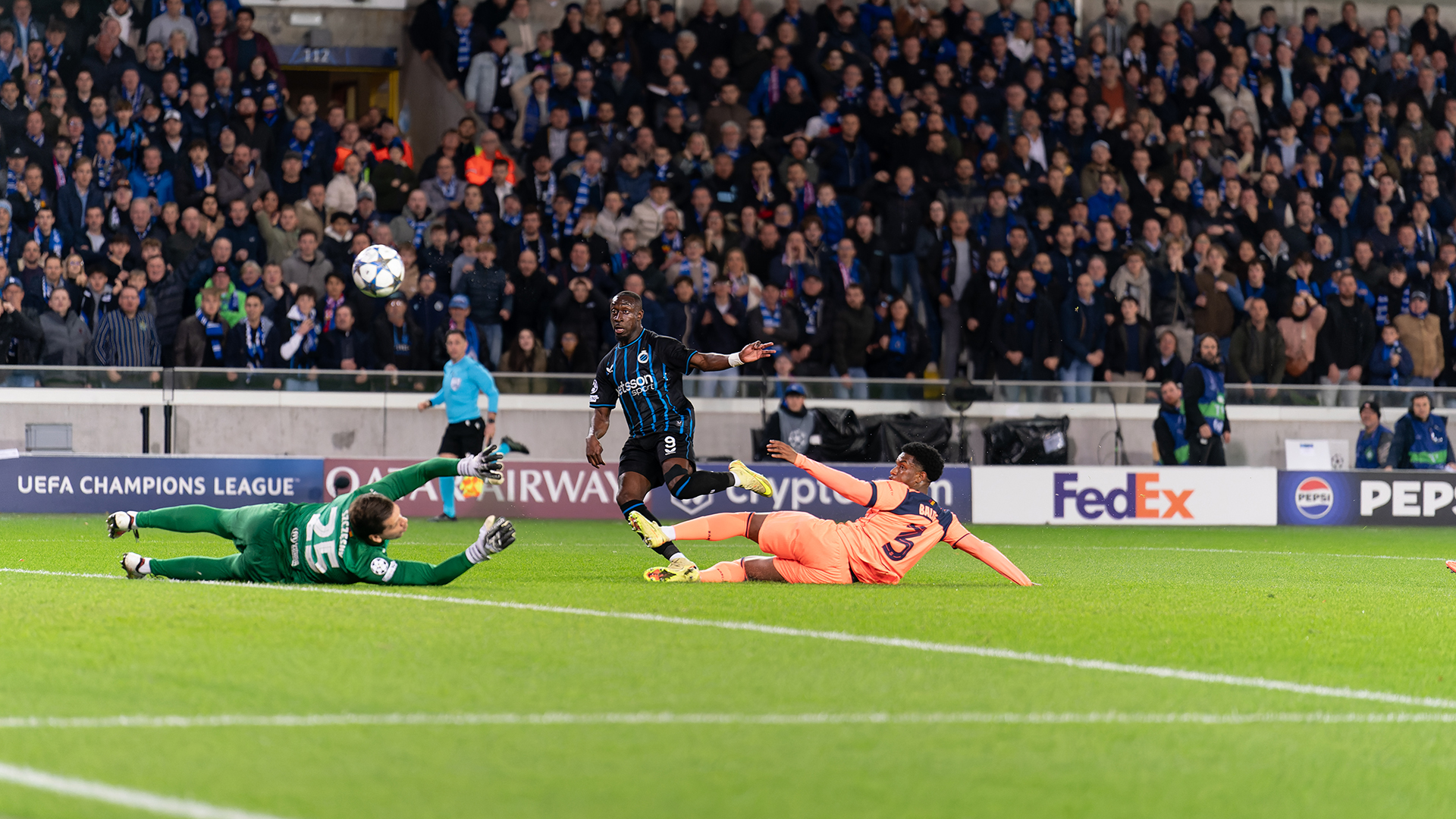 Carlos Forbs of Club Brugge celebrates after scoring the team's first goal against Wojciech Szczesny of FC Barcelona and Alejandro Balde of FC Barcelona during the UEFA Champions League 2025/26 League Phase MD4 match between Club Brugge KV and FC Barcelona at Jan Breydelstadion on November 5, 2025 in Bruges, Belgium.