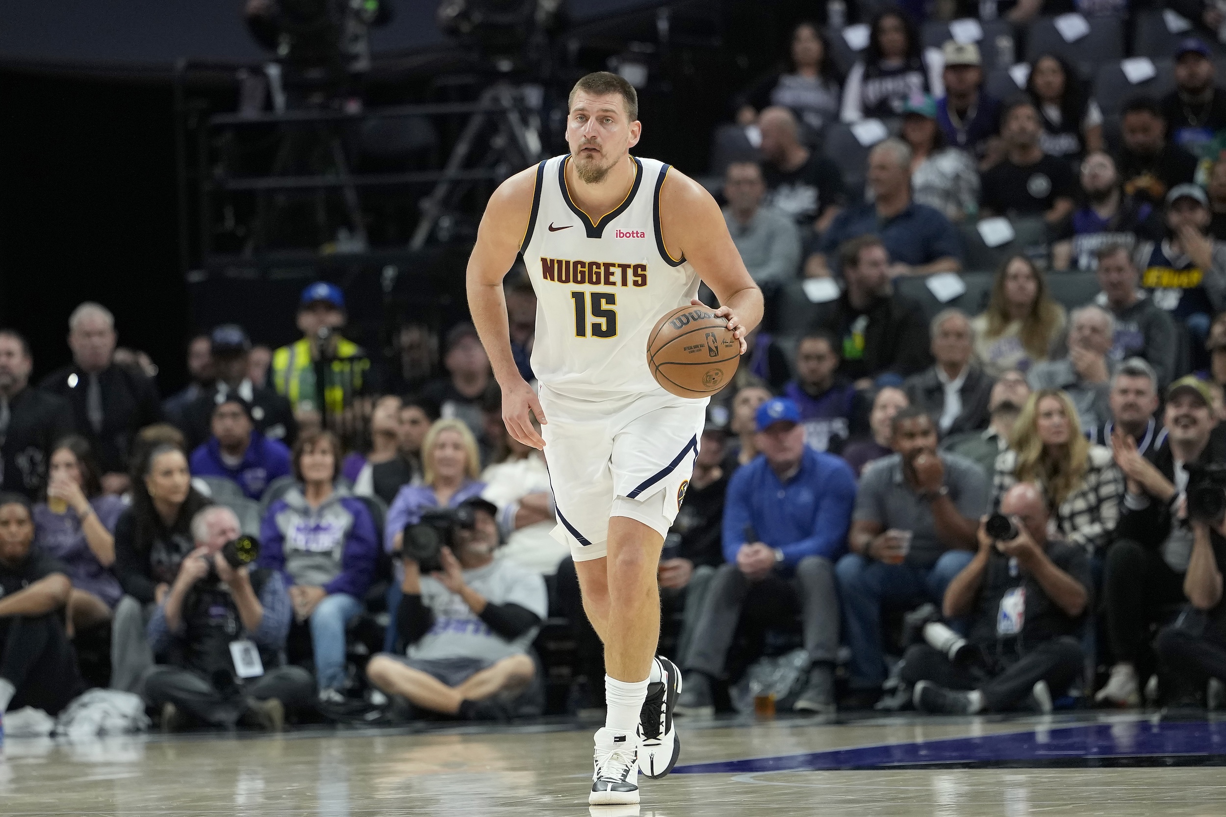 Nikola Jokic handles the pill.