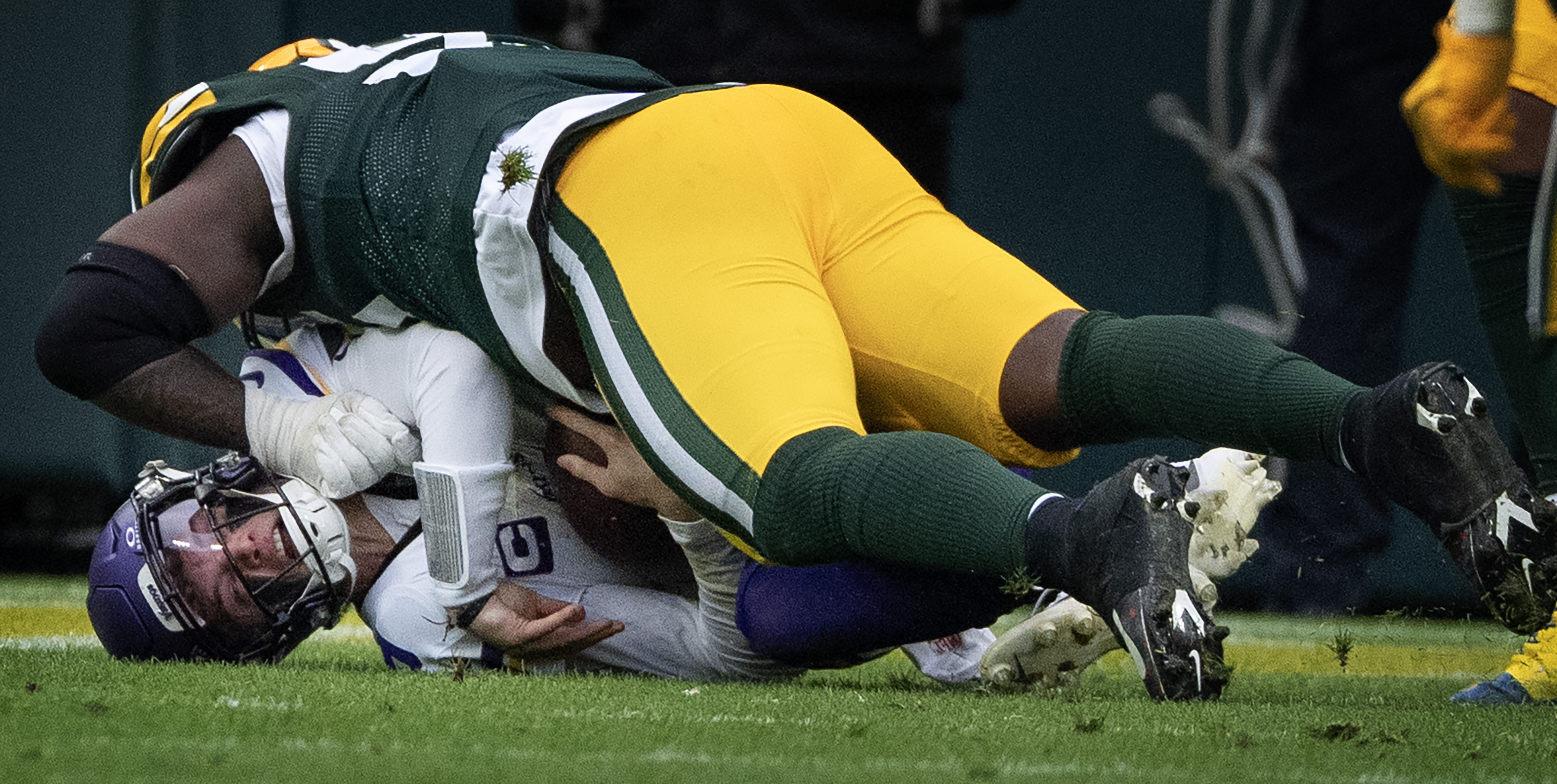 GREEN BAY, WI. - NOVEMBER 2025: Green Bay Packers defensive tackle Devonte Wyatt (95) sacked Minnesota Vikings quarterback J.J. McCarthy (9) during the fourth quarter at Lambeau Sunday, November 23, 2025 at Lambeau Field