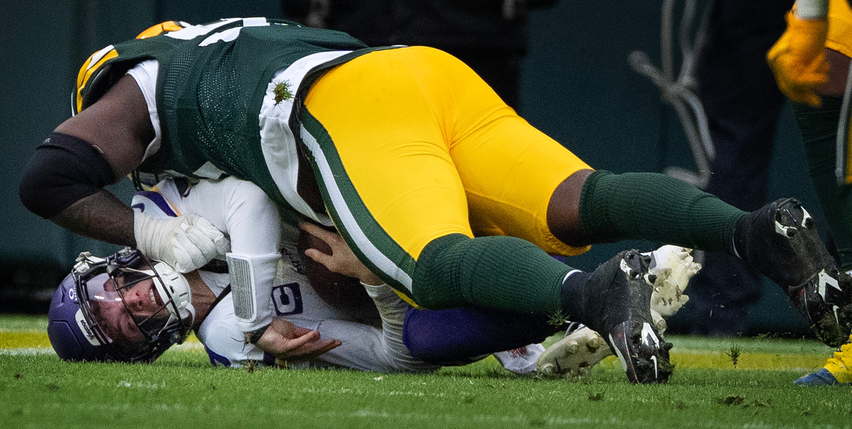 GREEN BAY, WI. - NOVEMBER 2025: Green Bay Packers defensive tackle Devonte Wyatt (95) sacked Minnesota Vikings quarterback J.J. McCarthy (9) during the fourth quarter at Lambeau Sunday, November 23, 2025 at Lambeau Field