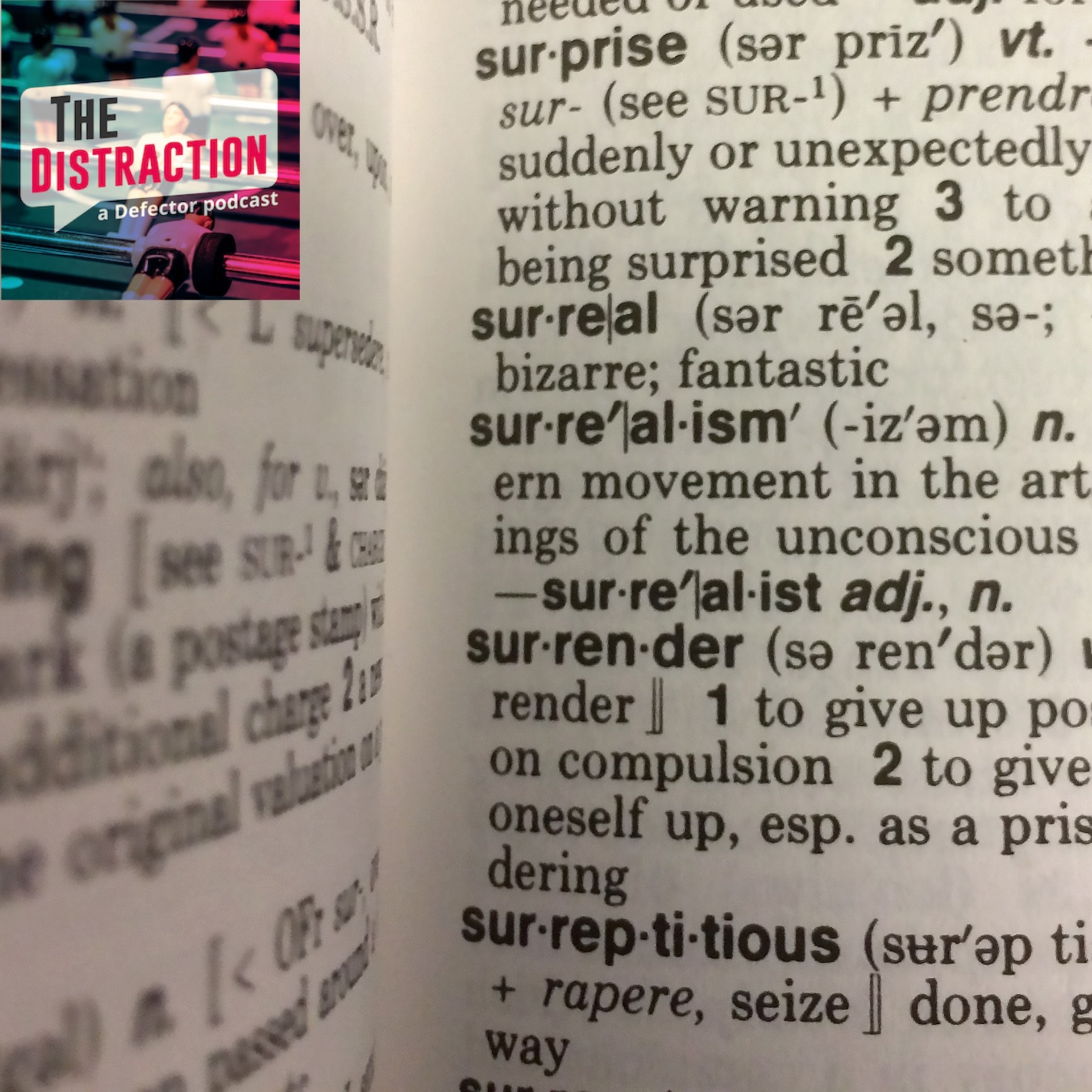 This December 16, 2016 photo illustration taken in Washington, DC. shows the definition for the word "Surreal" in a copy of the Webster's Desktop Dictionary.
