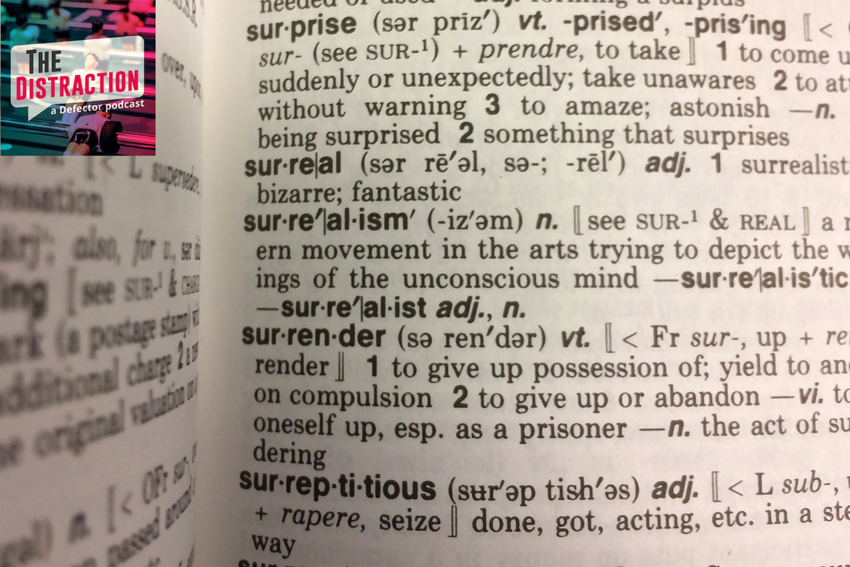 This December 16, 2016 photo illustration taken in Washington, DC. shows the definition for the word "Surreal" in a copy of the Webster's Desktop Dictionary.