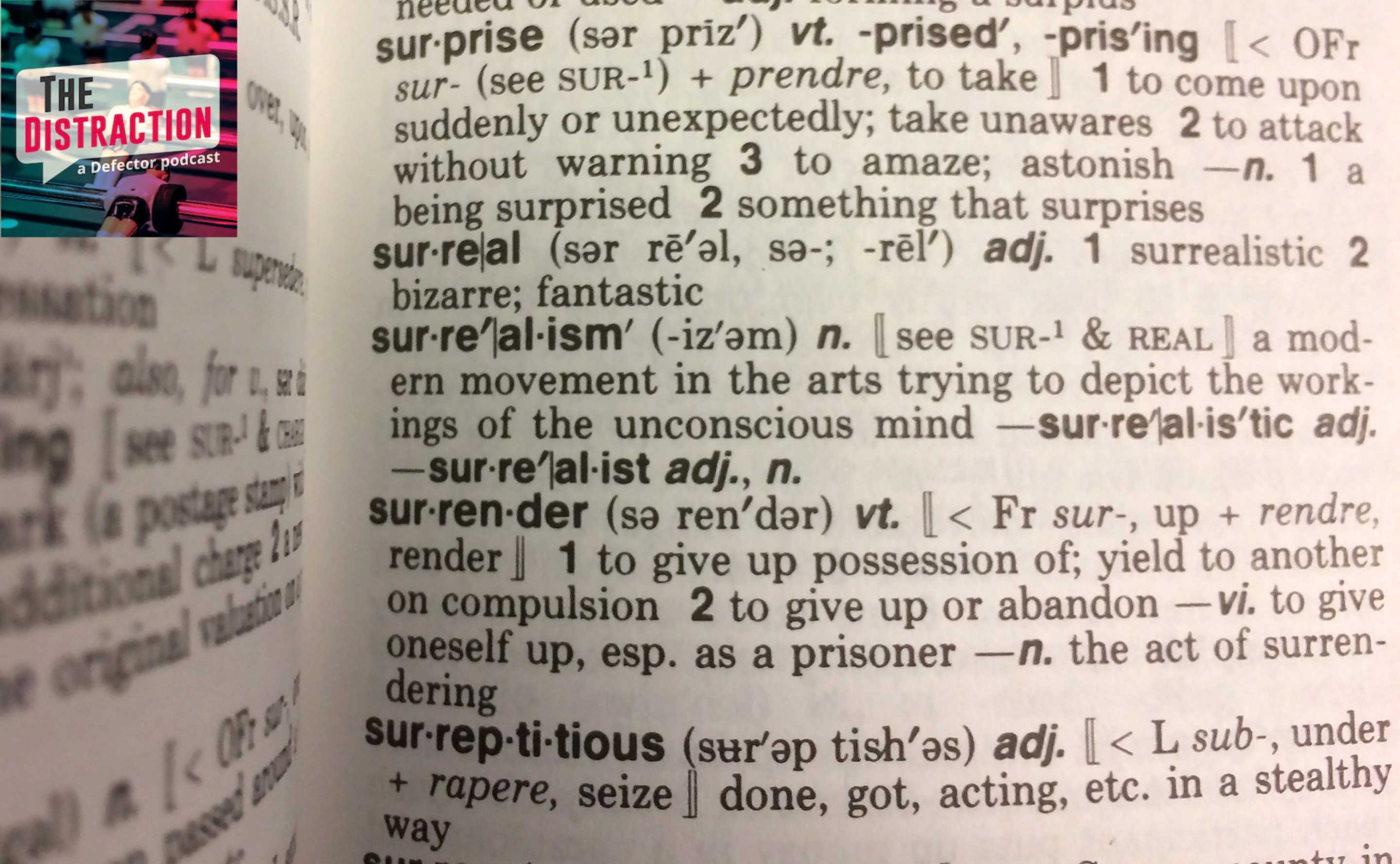 This December 16, 2016 photo illustration taken in Washington, DC. shows the definition for the word "Surreal" in a copy of the Webster's Desktop Dictionary.