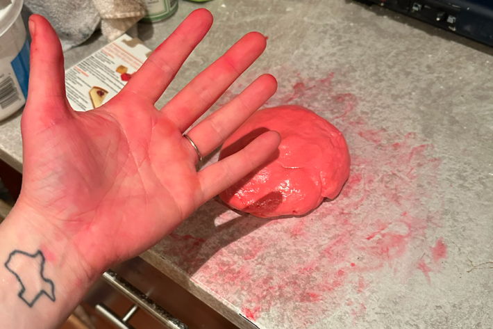Pink hand and pink fondant
