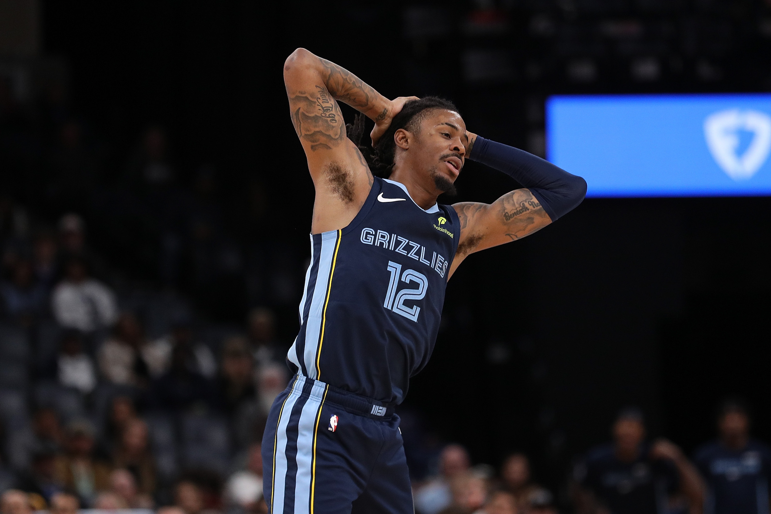 MEMPHIS, TENNESSEE - NOVEMBER 03: Ja Morant #12 of the Memphis Grizzlies reacts during the second half against the Detroit Pistons at FedExForum on November 03, 2025 in Memphis, Tennessee. NOTE TO USER: User expressly acknowledges and agrees that, by downloading and or using this photograph, User is consenting to the terms and conditions of the Getty Images License Agreement. (Photo by Justin Ford/Getty Images)