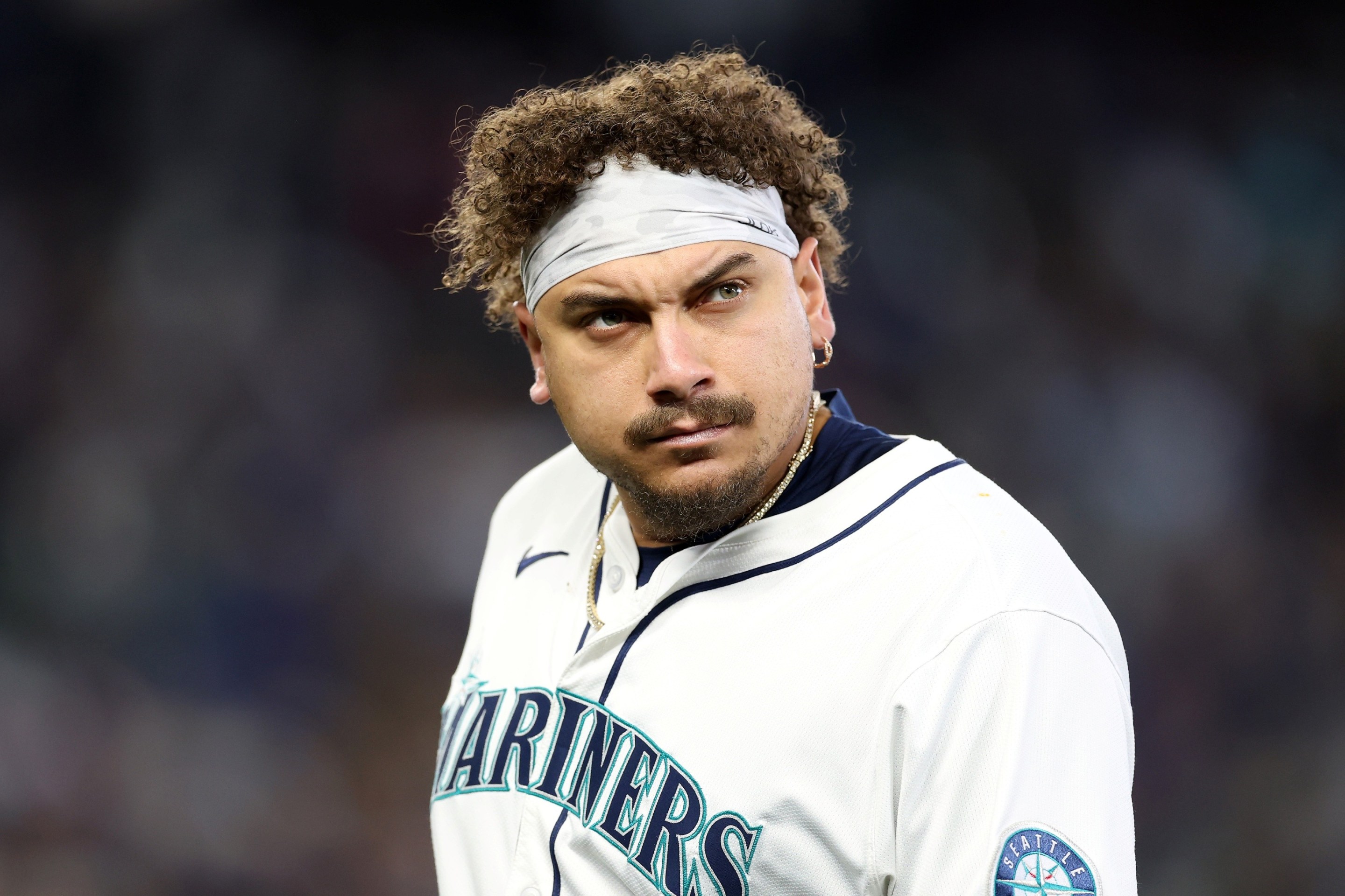 osh Naylor #12 of the Seattle Mariners reacts after grounding out to end the first inning.