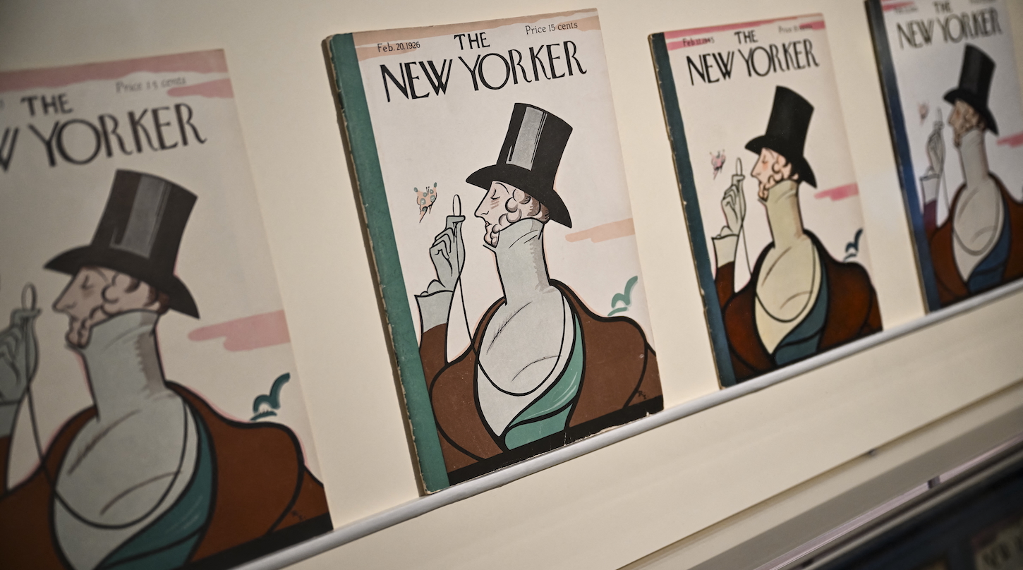First issues of The New Yorker with a caricature cover of Eustace Tilley drawn by Rea Irvin, are displayed at the "Covering The New Yorker" exhibition to commemorate the magazine’s 100th anniversary.