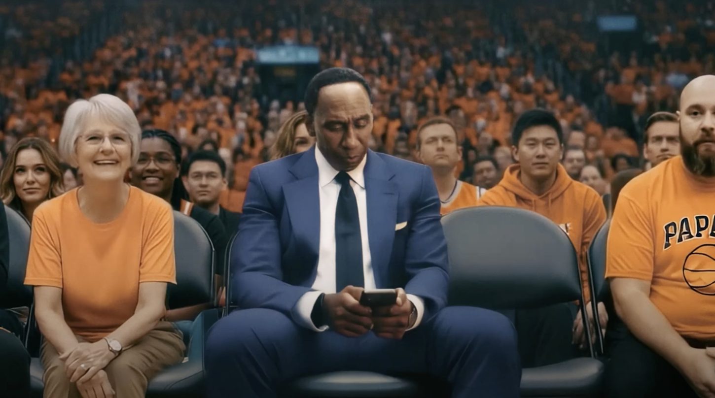 Stephen A. Smith playing solitaire on his phone during the NBA Finals