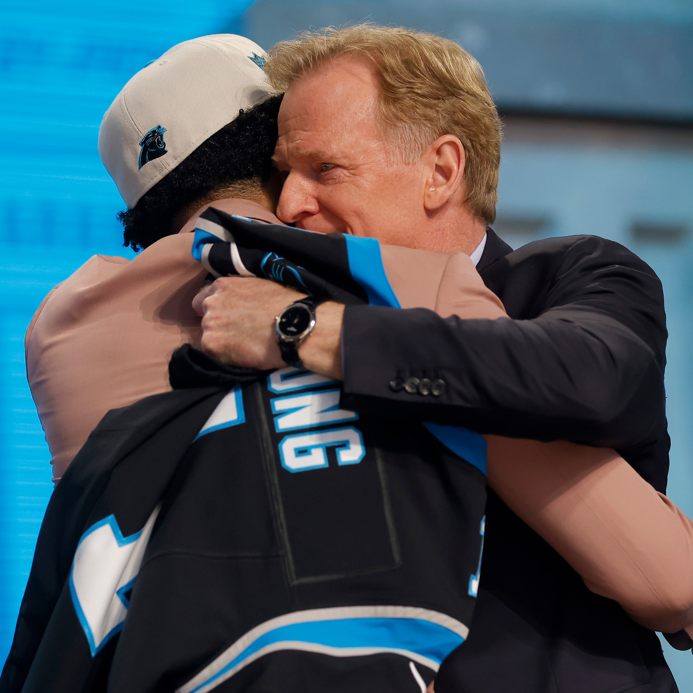 Bryce Young hugs NFL Commissioner Roger Goodell after being selected first overall by the Carolina Panthers during the first round of the 2023 NFL Draft at Union Station on April 27, 2023 in Kansas City, Missouri.