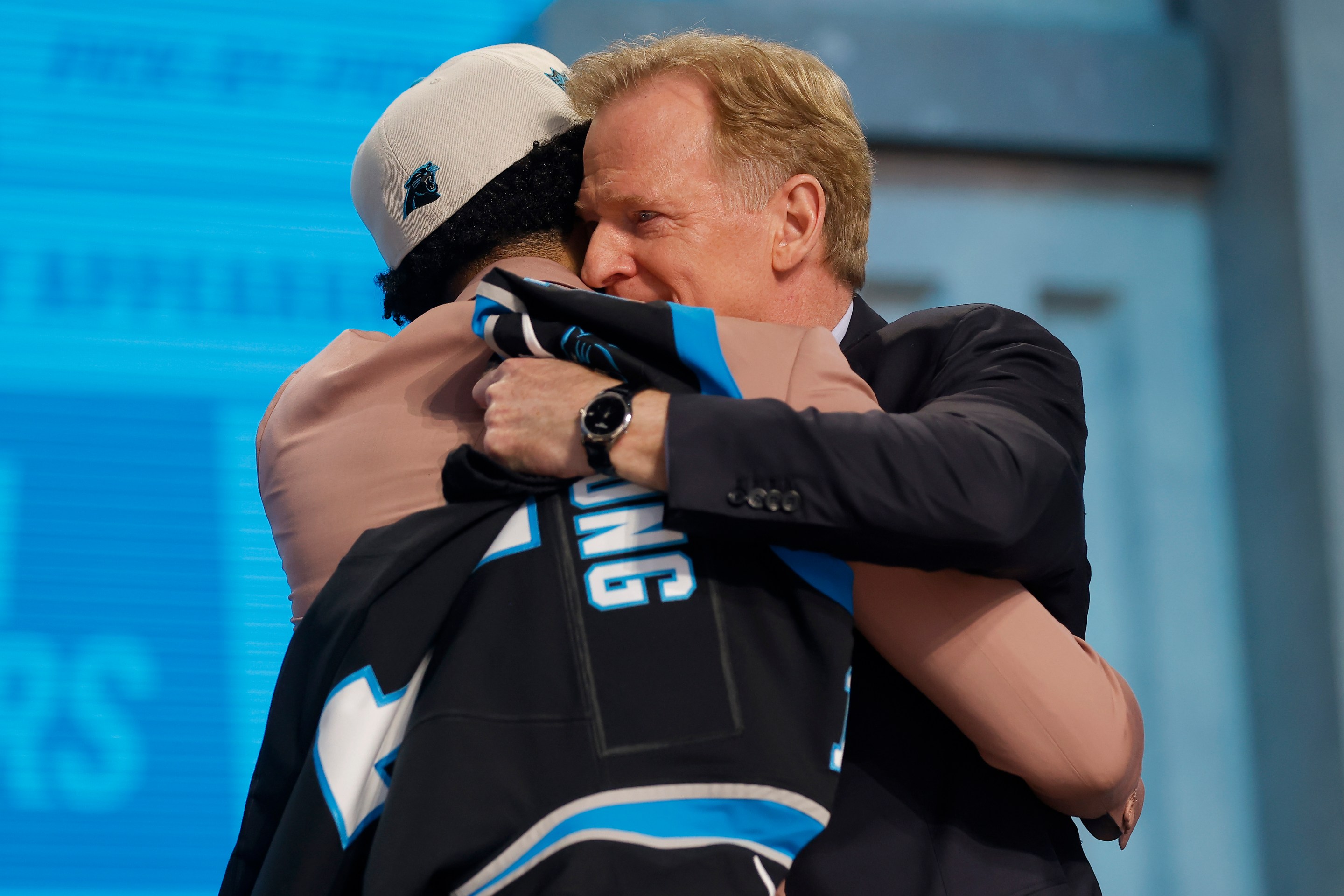 Bryce Young hugs NFL Commissioner Roger Goodell after being selected first overall by the Carolina Panthers during the first round of the 2023 NFL Draft at Union Station on April 27, 2023 in Kansas City, Missouri.