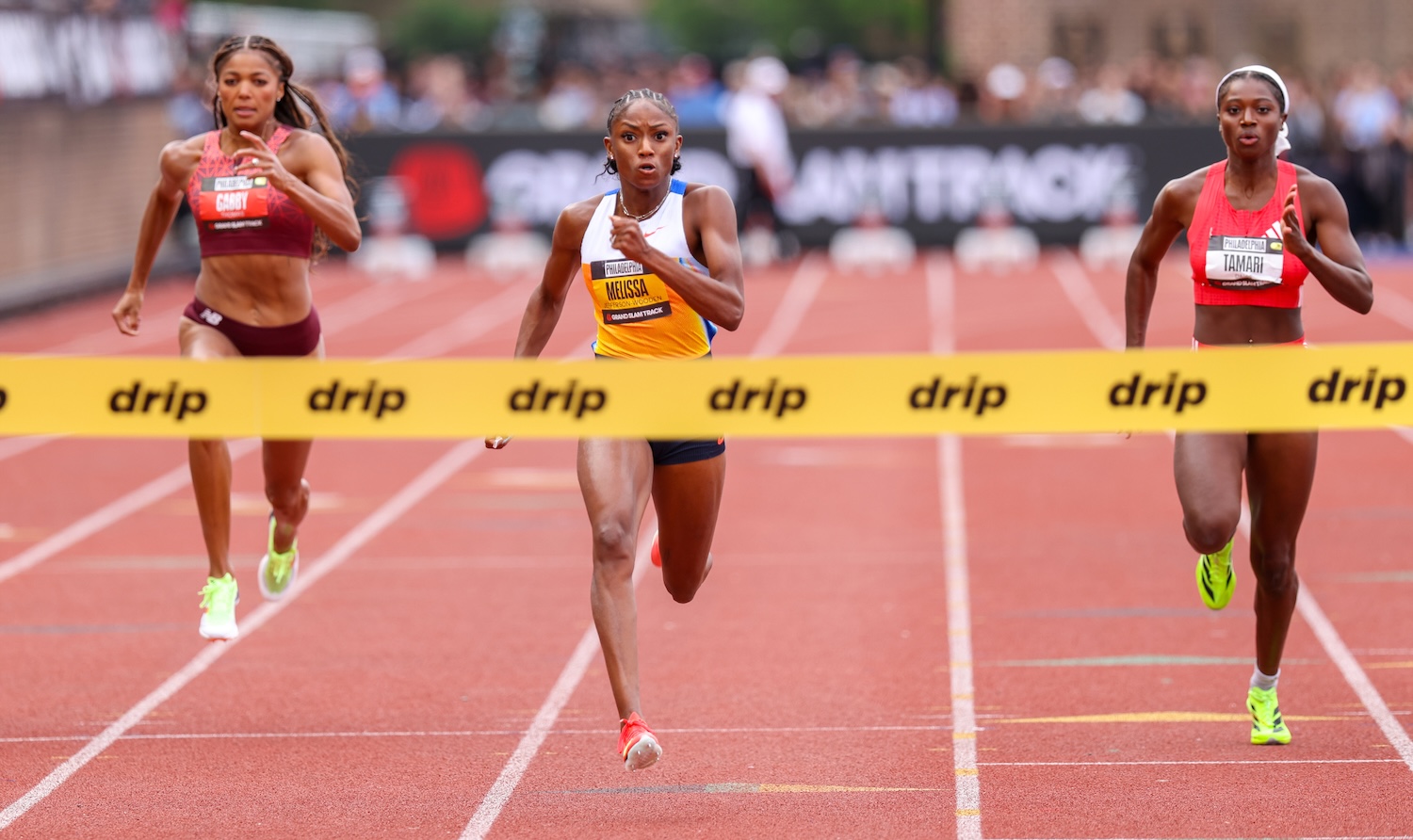 PHILADELPHIA, PENNSYLVANIA - JUNE 1: Gabby Thomas, Melissa Jefferson-Wooden, and Tamari Davis compete in the women's 100m race at Franklin Field at the University of Pennsylvania on June 1, 2025 in Philadelphia, Pennsylvania. (Photo by Roger Wimmer/ISI Photos/Getty Images)