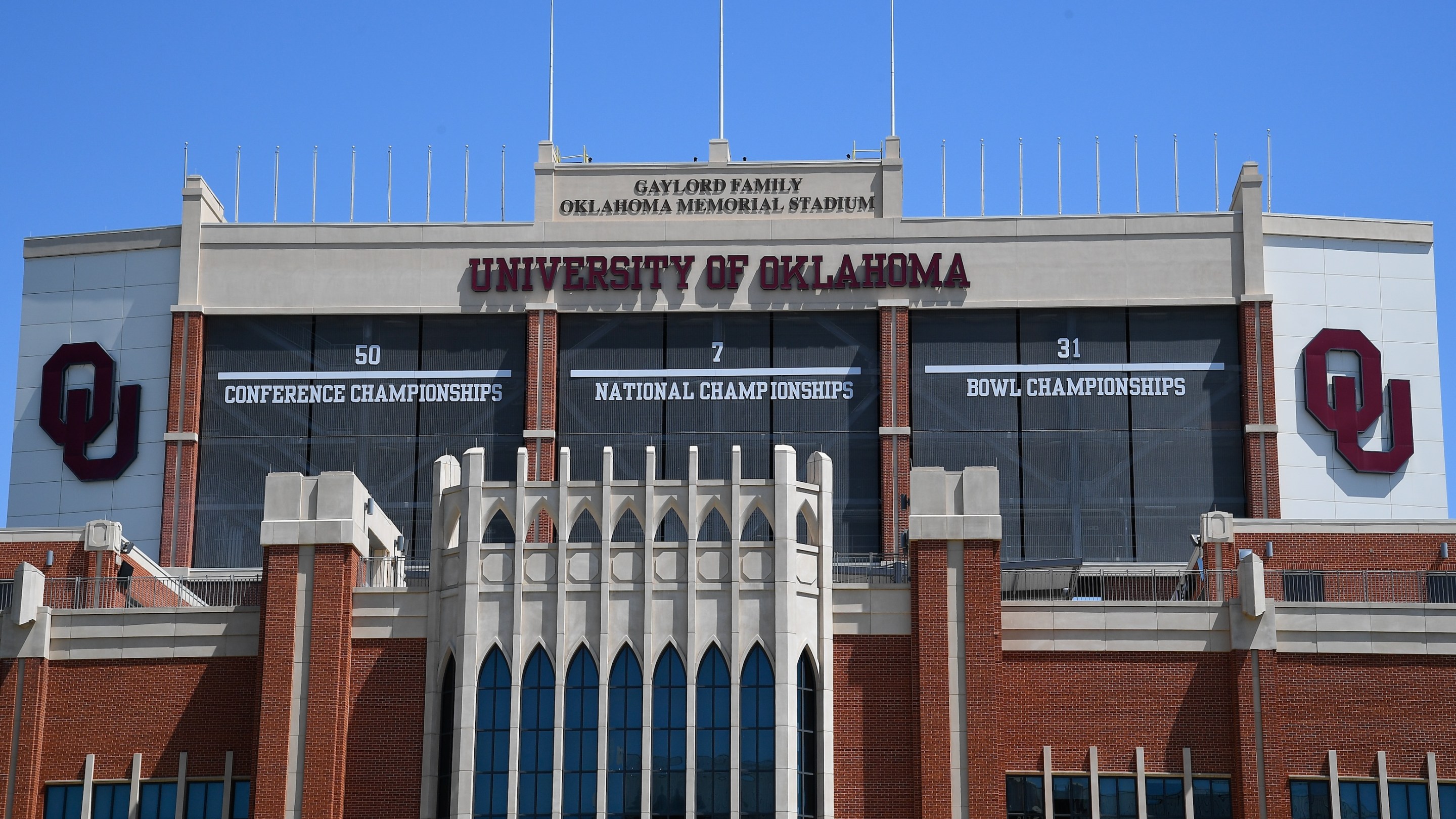 A general view of the OU logo and signage for 50 Conference Championships, 7 National Championships, and 31 Bowl Championships on June 8, 2025, on the facade of the Gaylord Family - Oklahoma Memorial Stadium at the University of Oklahoma in Norman, OK.